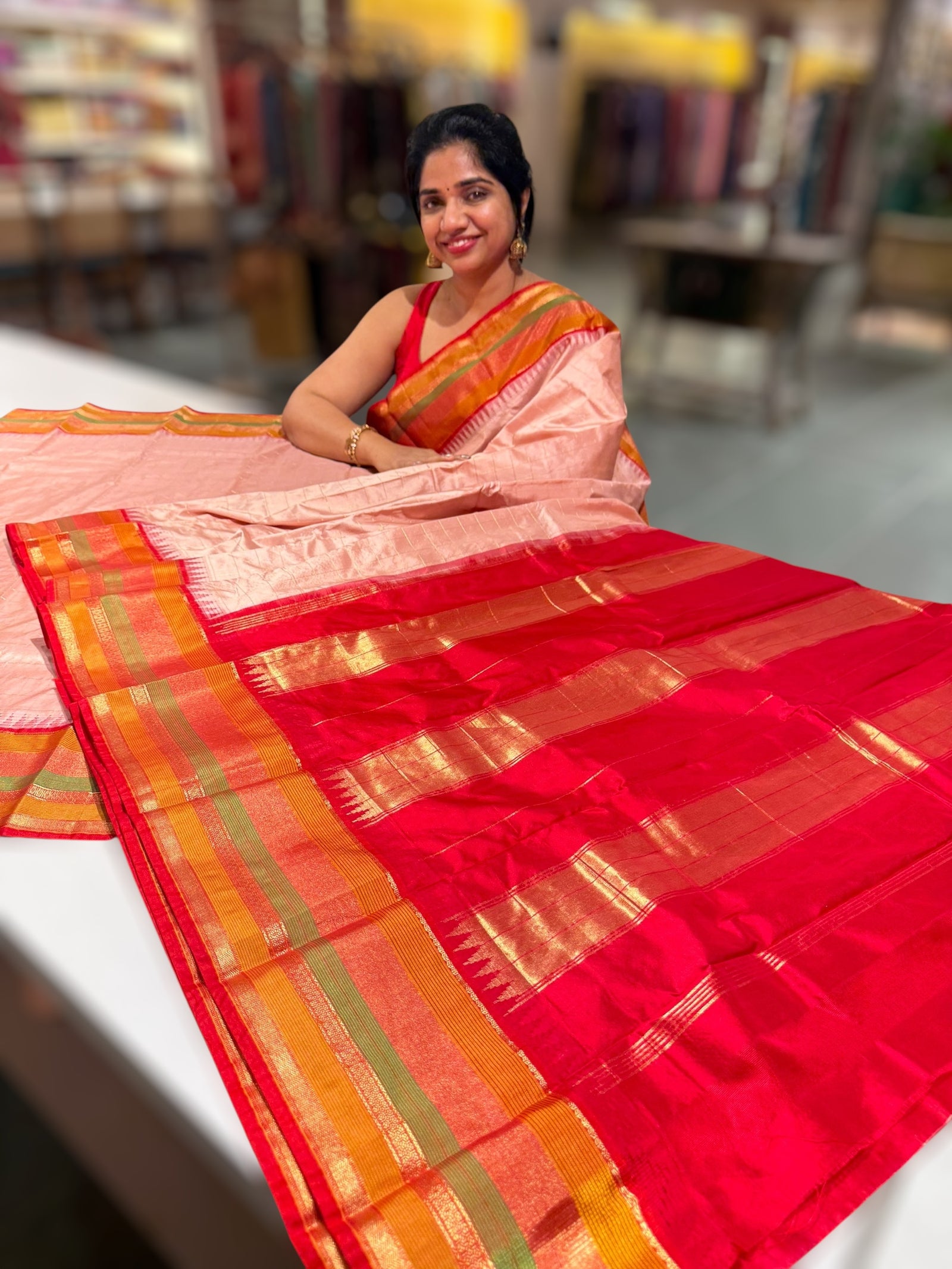 Pastel Pink Kanchi vintage style soft silk saree with zari checks & multi color border.