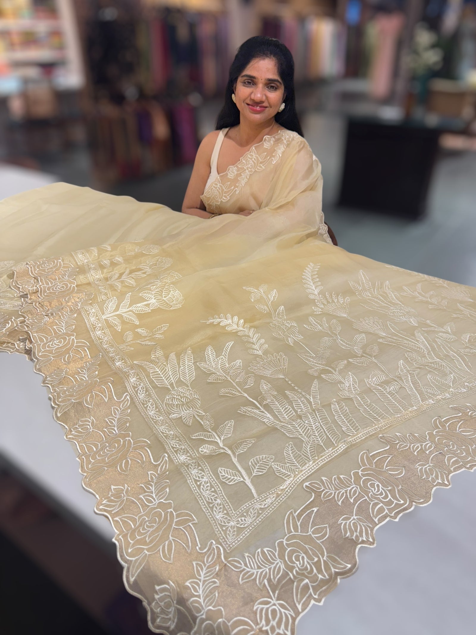Pastel Yellow Organza saree with heavy embroiderey