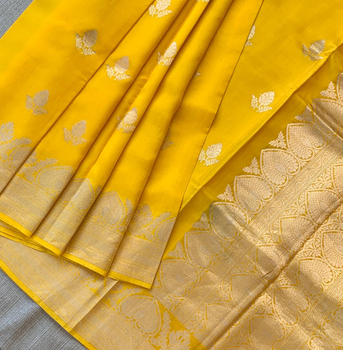 Yellow Poona Silk Saree in Monotone Look with heavy weaving borders & kaduwa woven motifs.