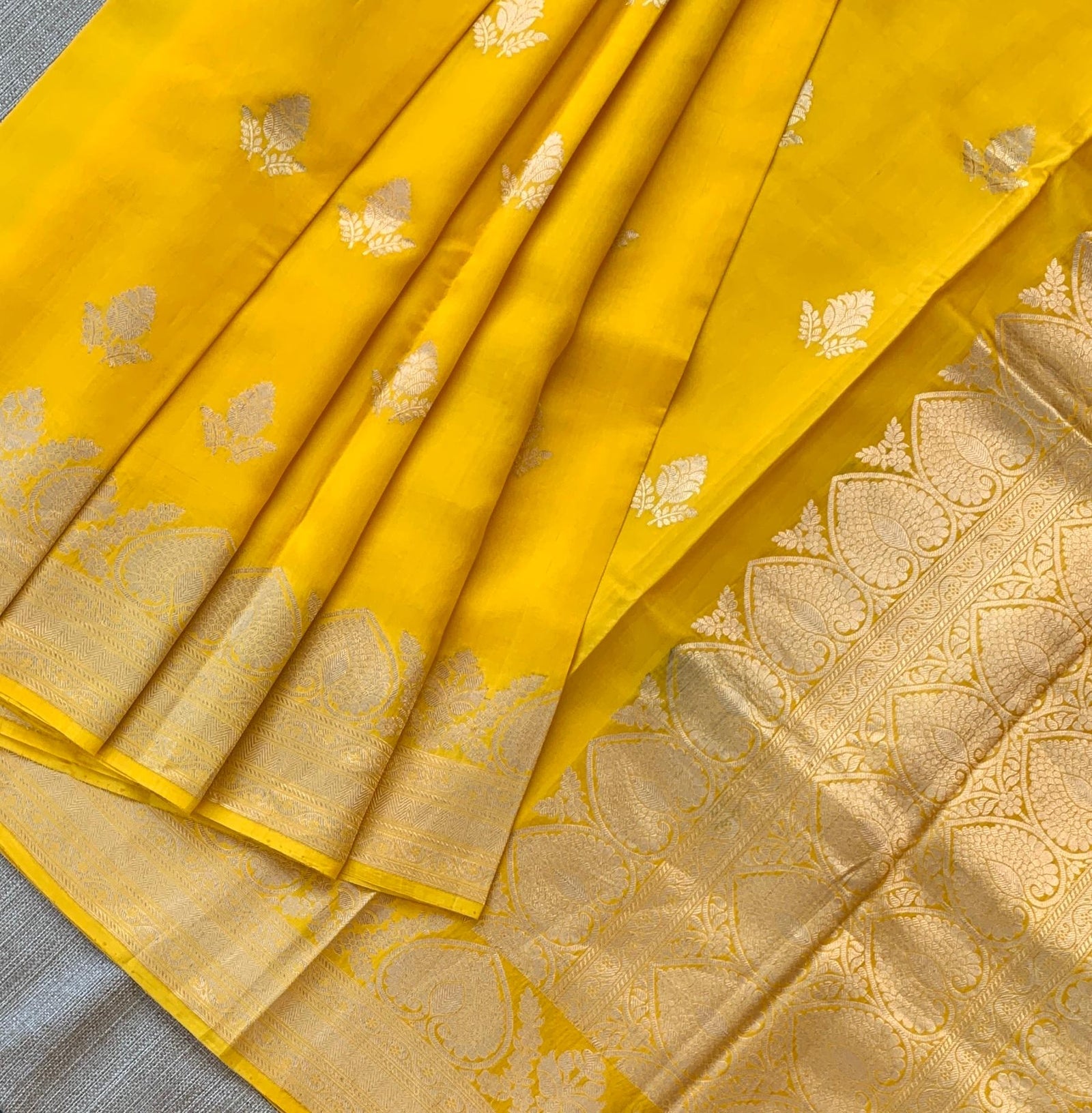 Yellow Poona Silk Saree in Monotone Look with heavy weaving borders & kaduwa woven motifs.