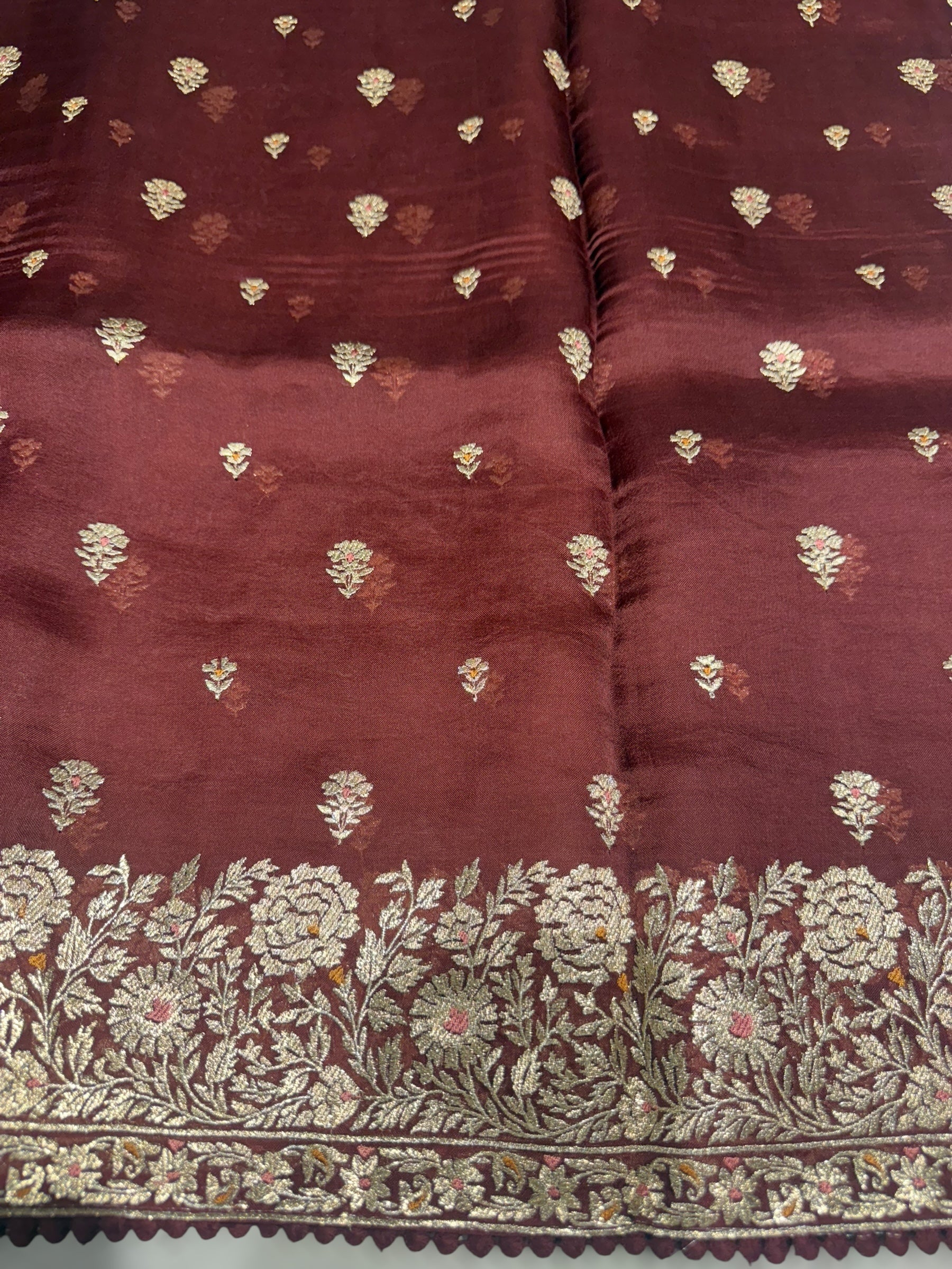 Meroonish Brown  Organza Saree with stunning heavy zari embroidered border and alloevr motifs