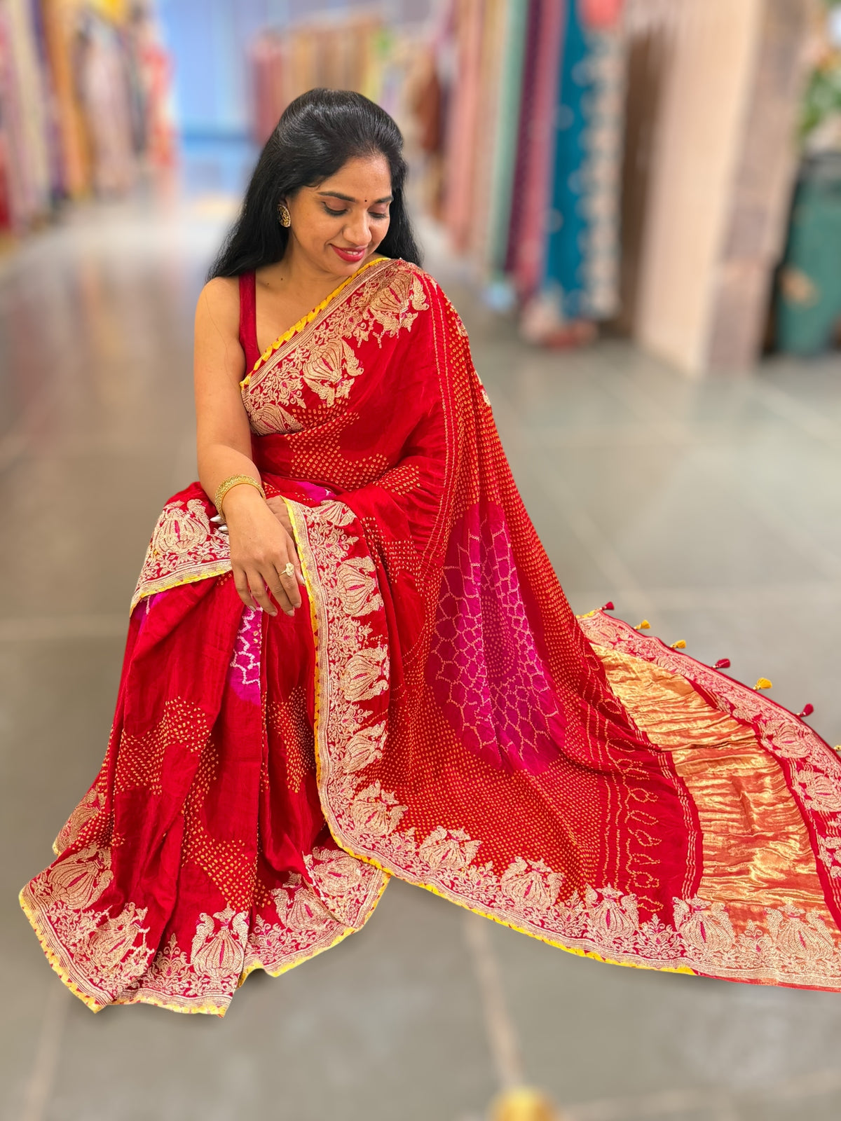 Red Rai bandhej Saree With Embroidered Border