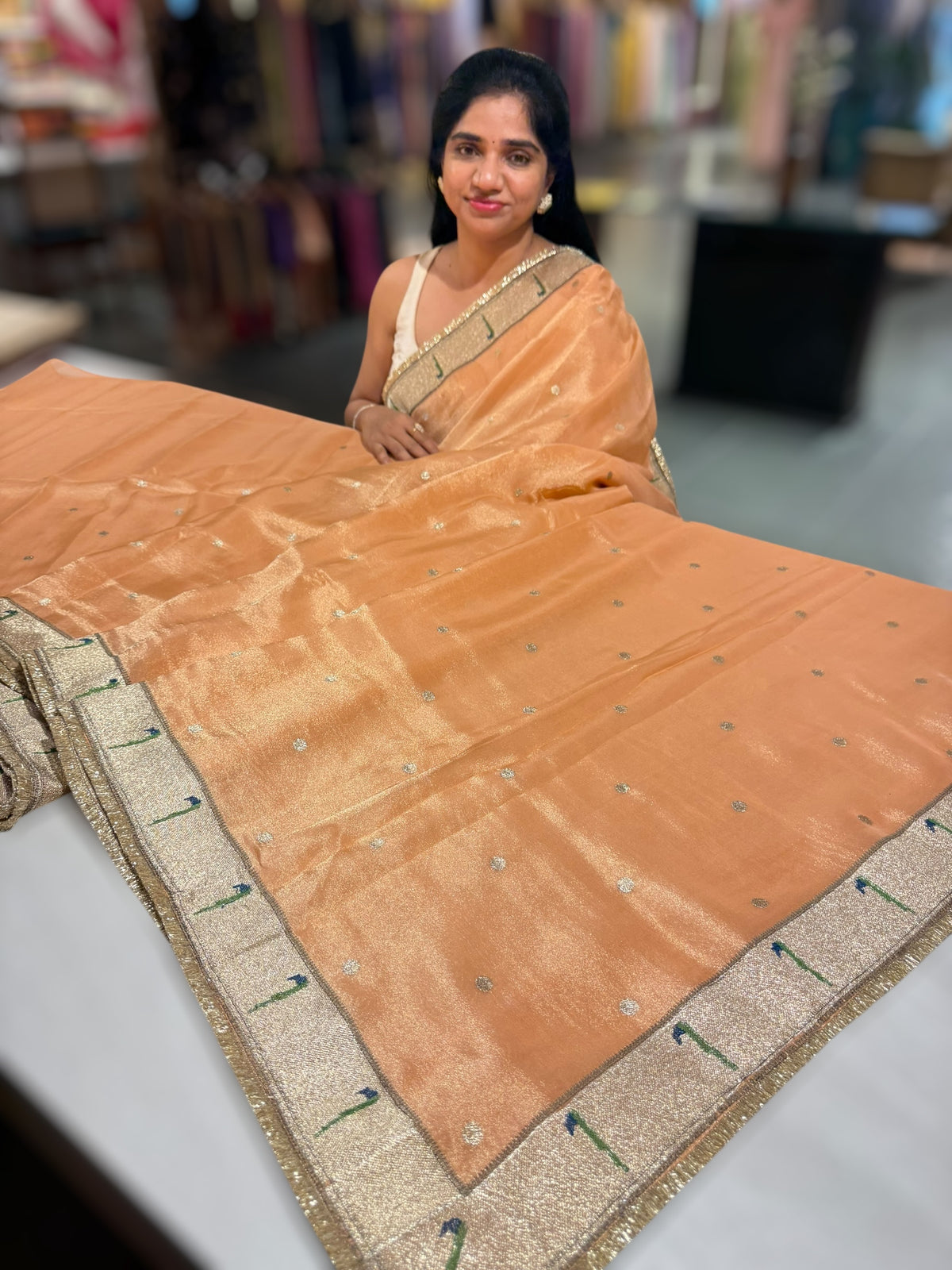 Peach Tissue Saree with pythani tissue embroidered border