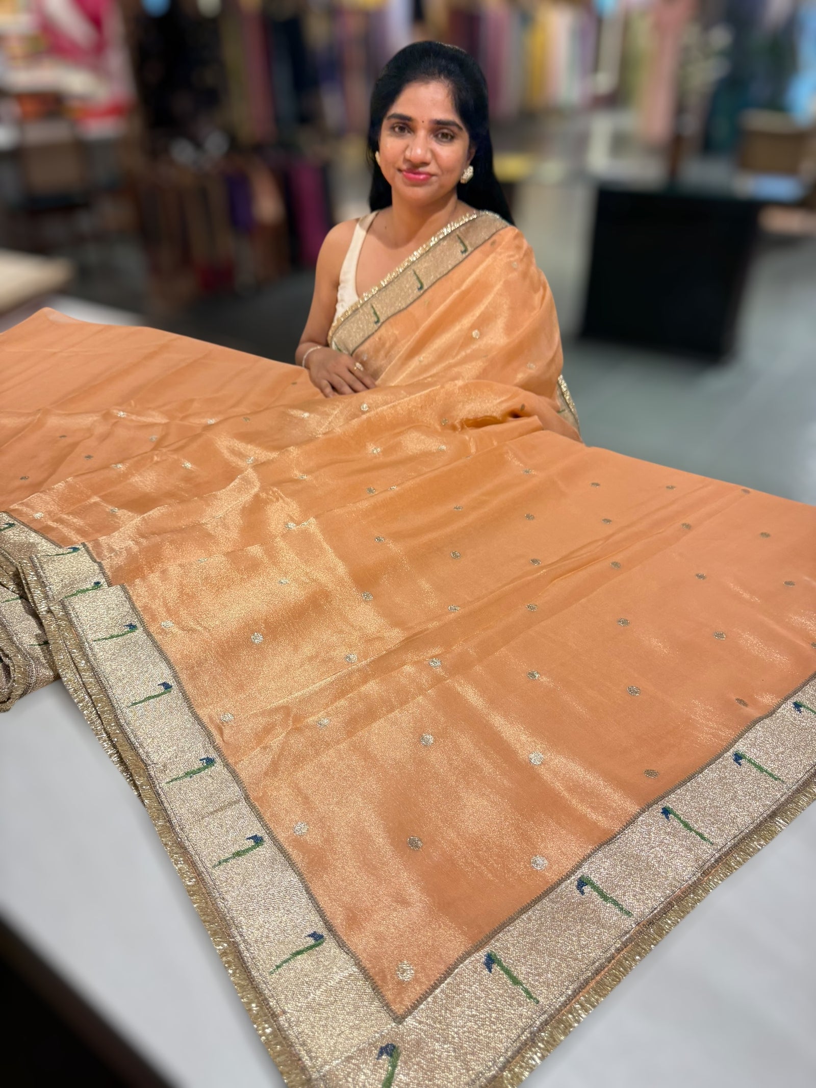 Peach Tissue Saree with pythani tissue embroidered border