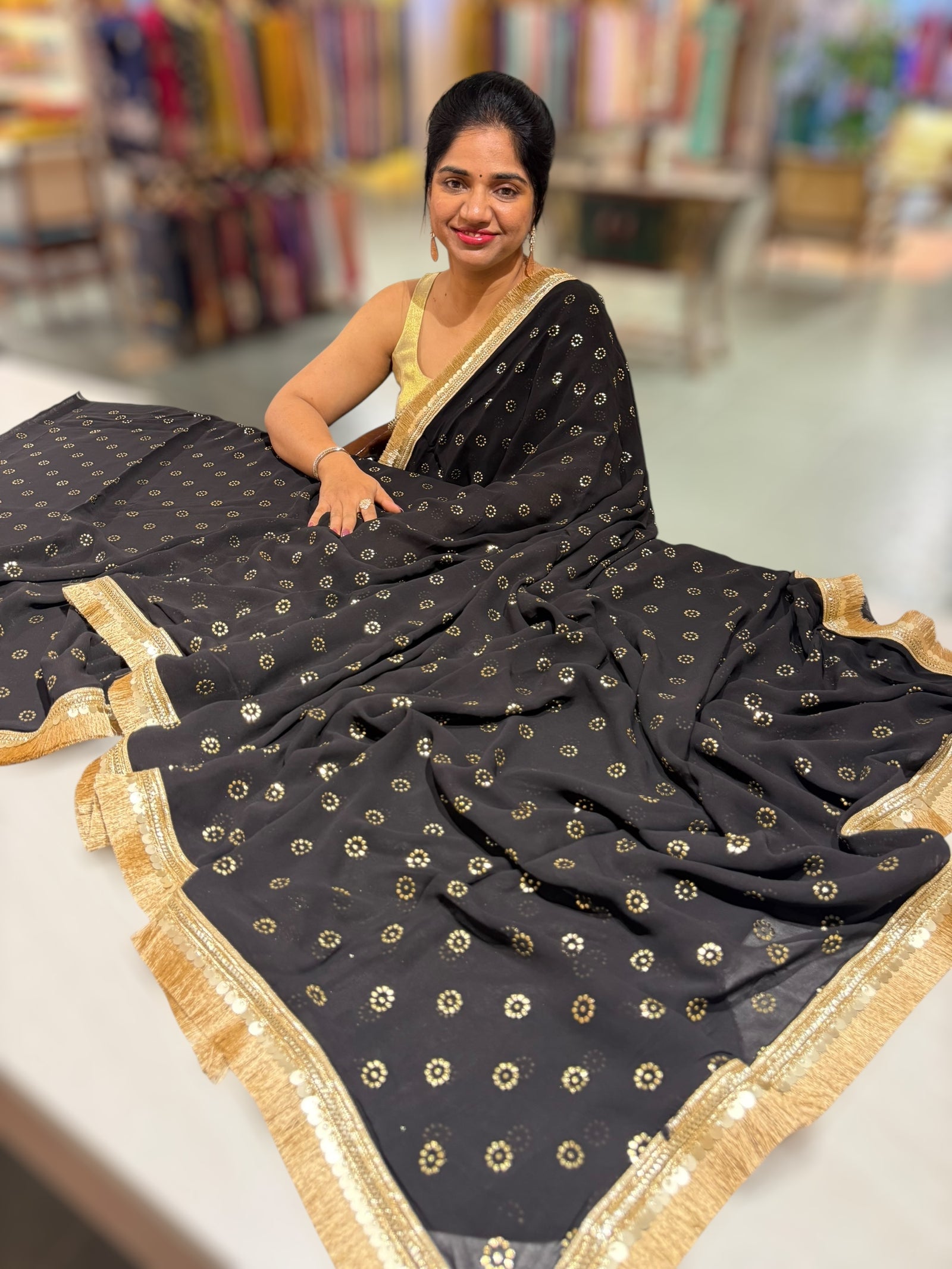 Black Georgette Saree with stick on Badla in flower pattern