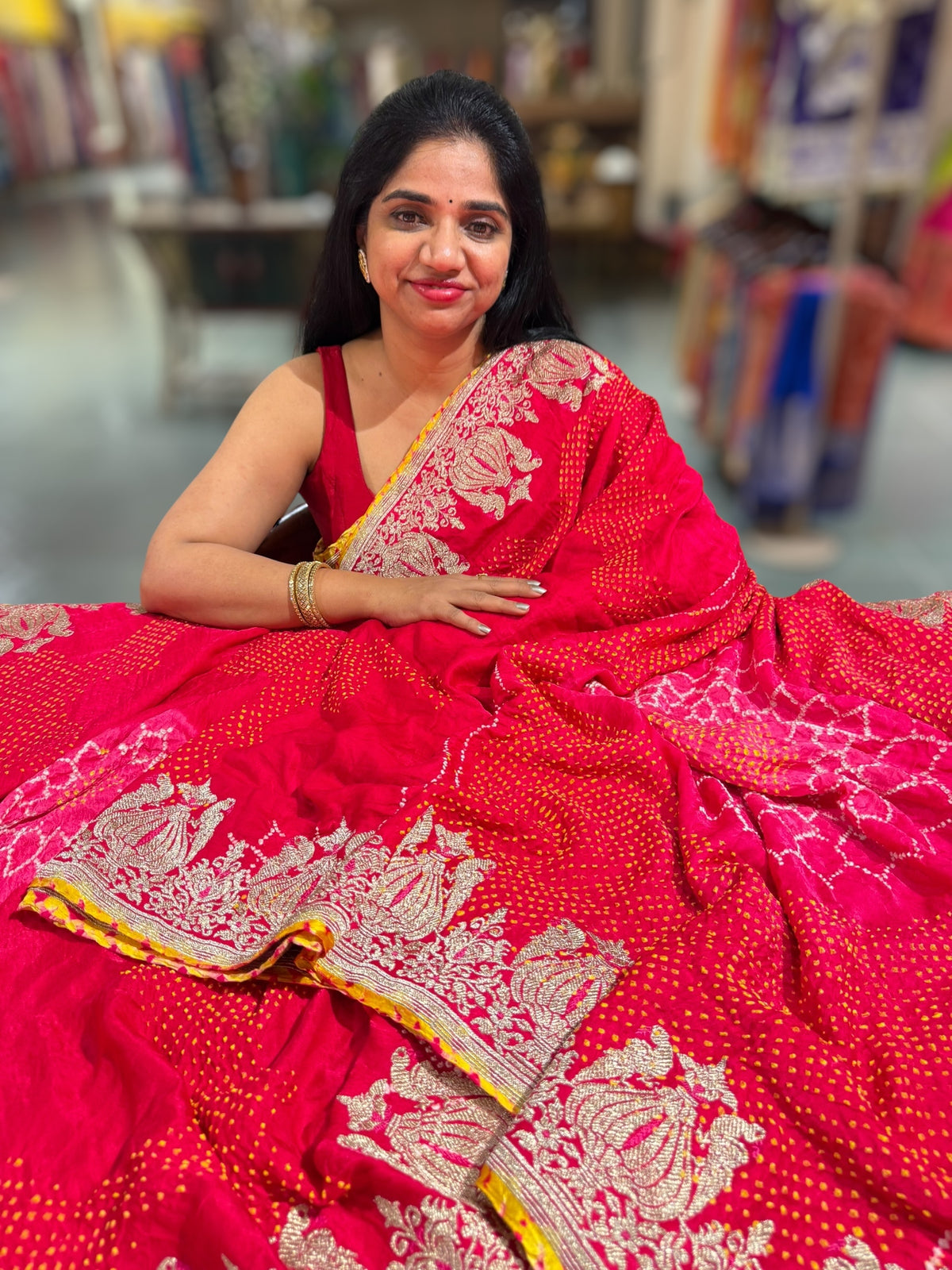 Reddish Pink Designer Rai Bandhej Saree With Embroidered Border