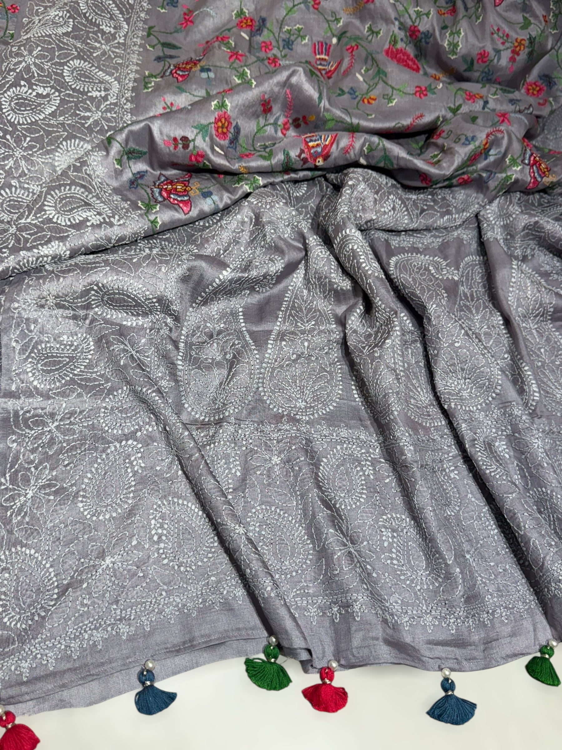 Lilac undertone tussar Saree with lucknowi border and pallu with allover petite point embroidery.