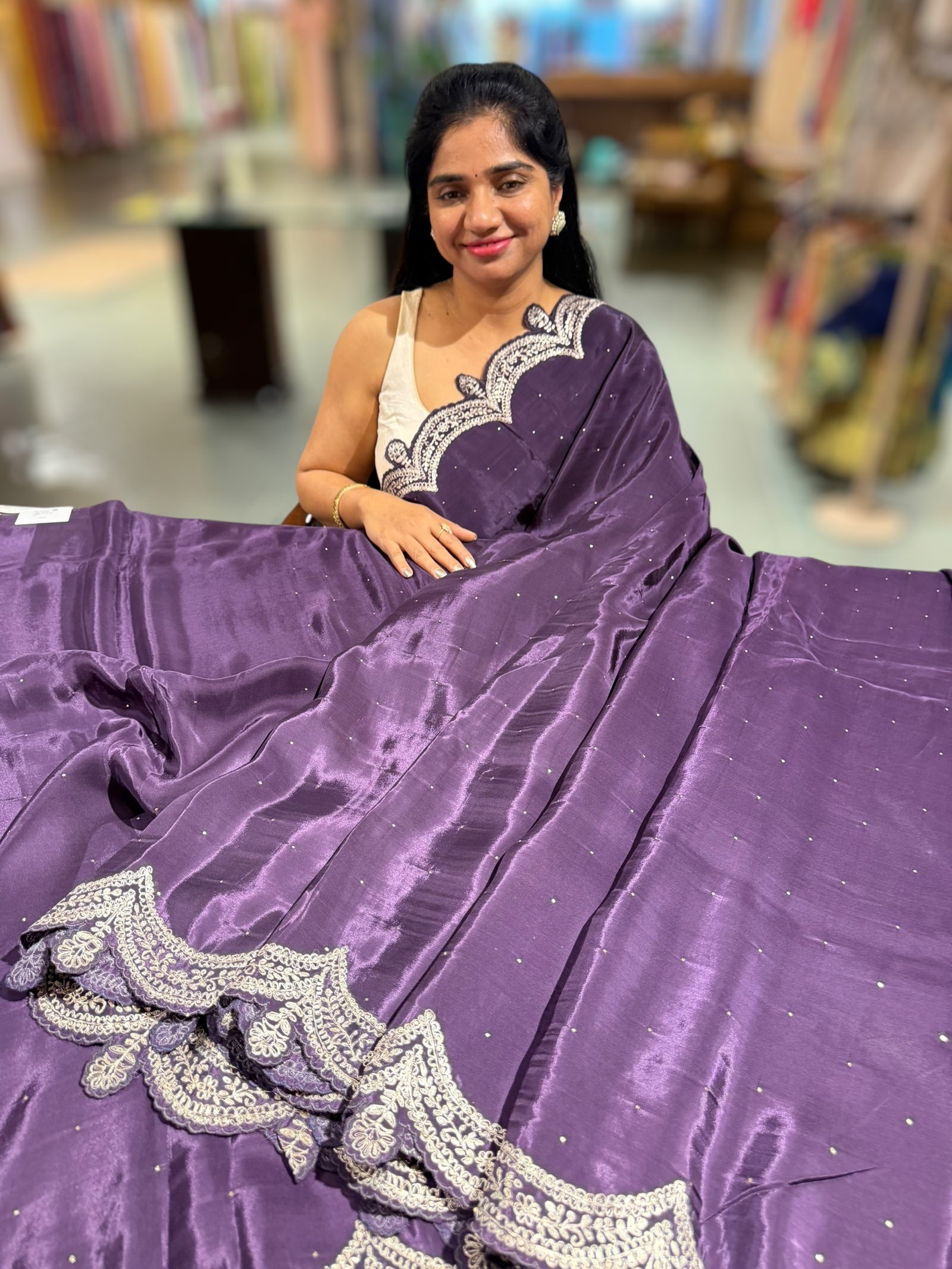 Plum crepe silk saree with scalloped pita border
