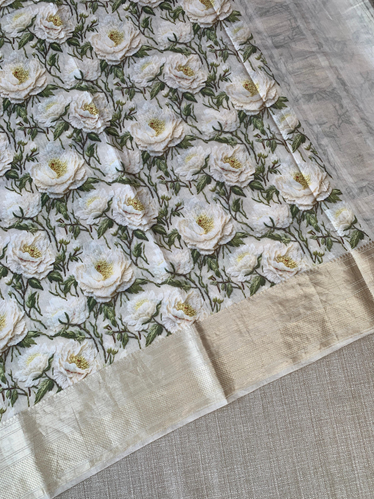 Ivory Pure Handloom Chiniya Silk Saree with stunning 3D Floral Print and zari borders