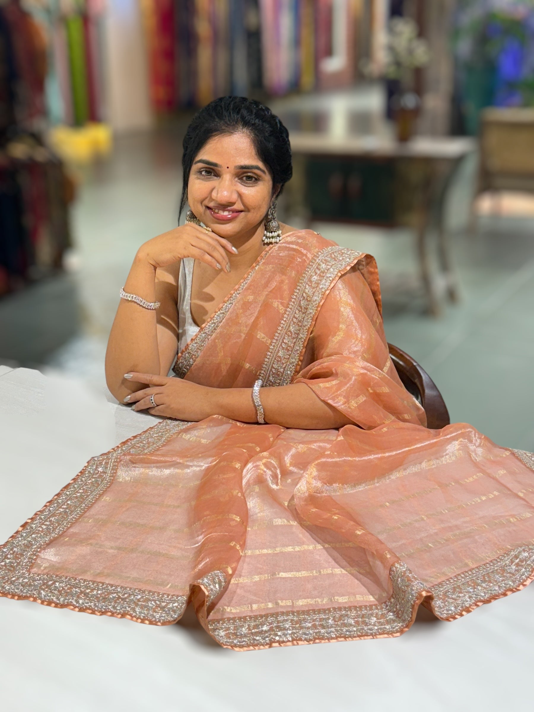 Peach Banarasi Tissue checks Saree with Sabyasachi Borders