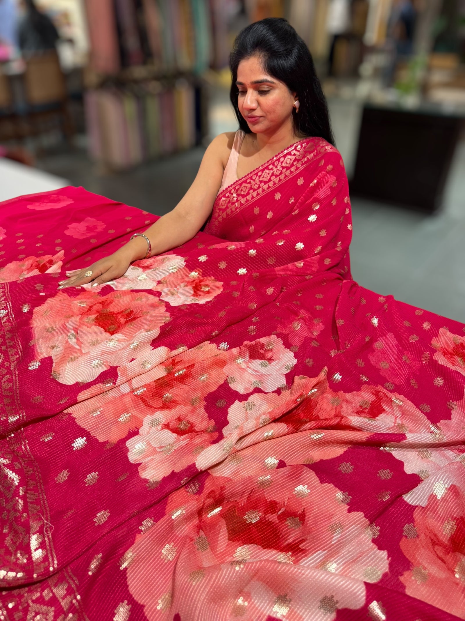 Reddish Pink georgette sequence saree with statement floral print