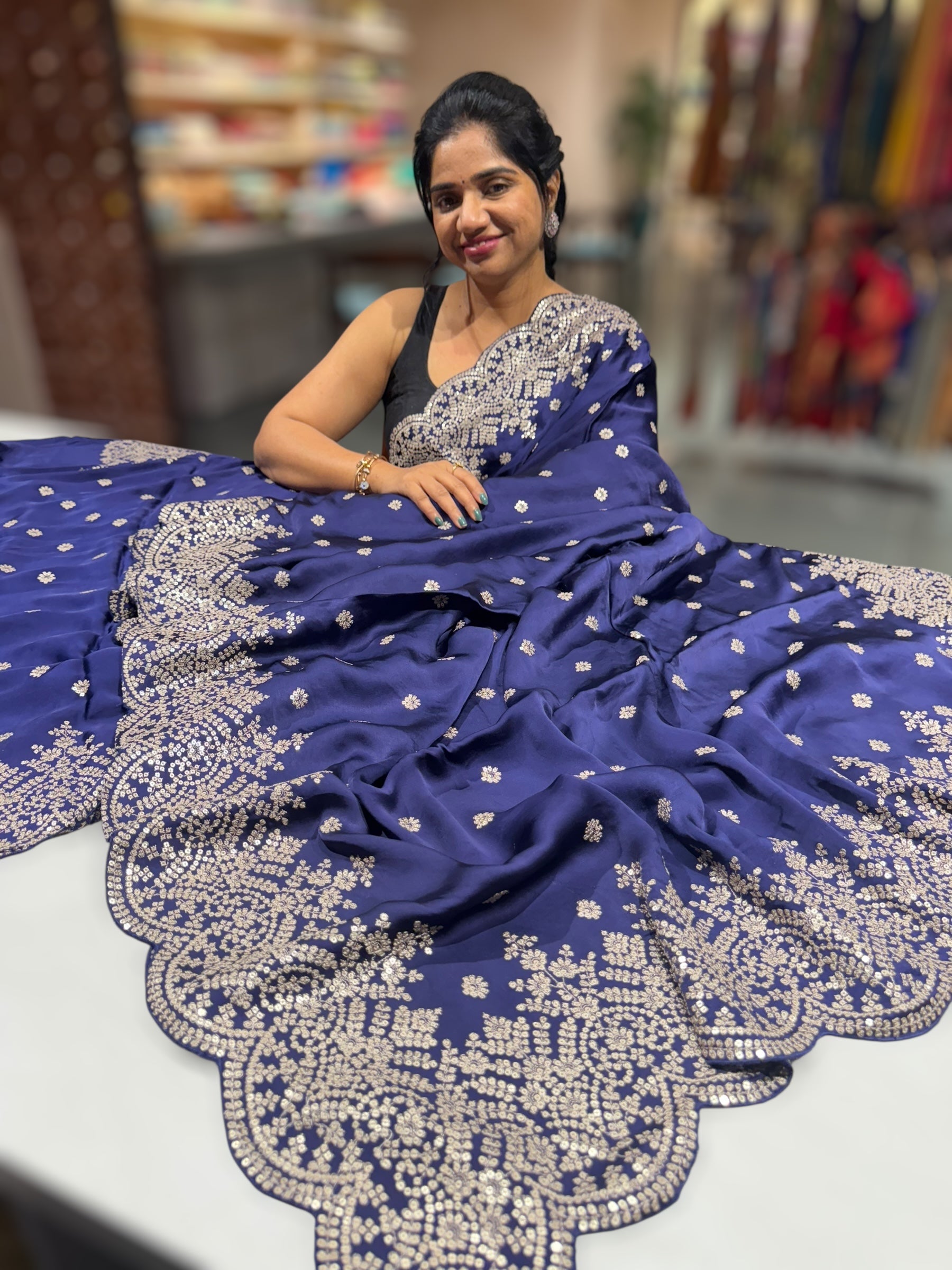 Purplish Blue Satin Saree with heavy sequnce embroidered scallop Border