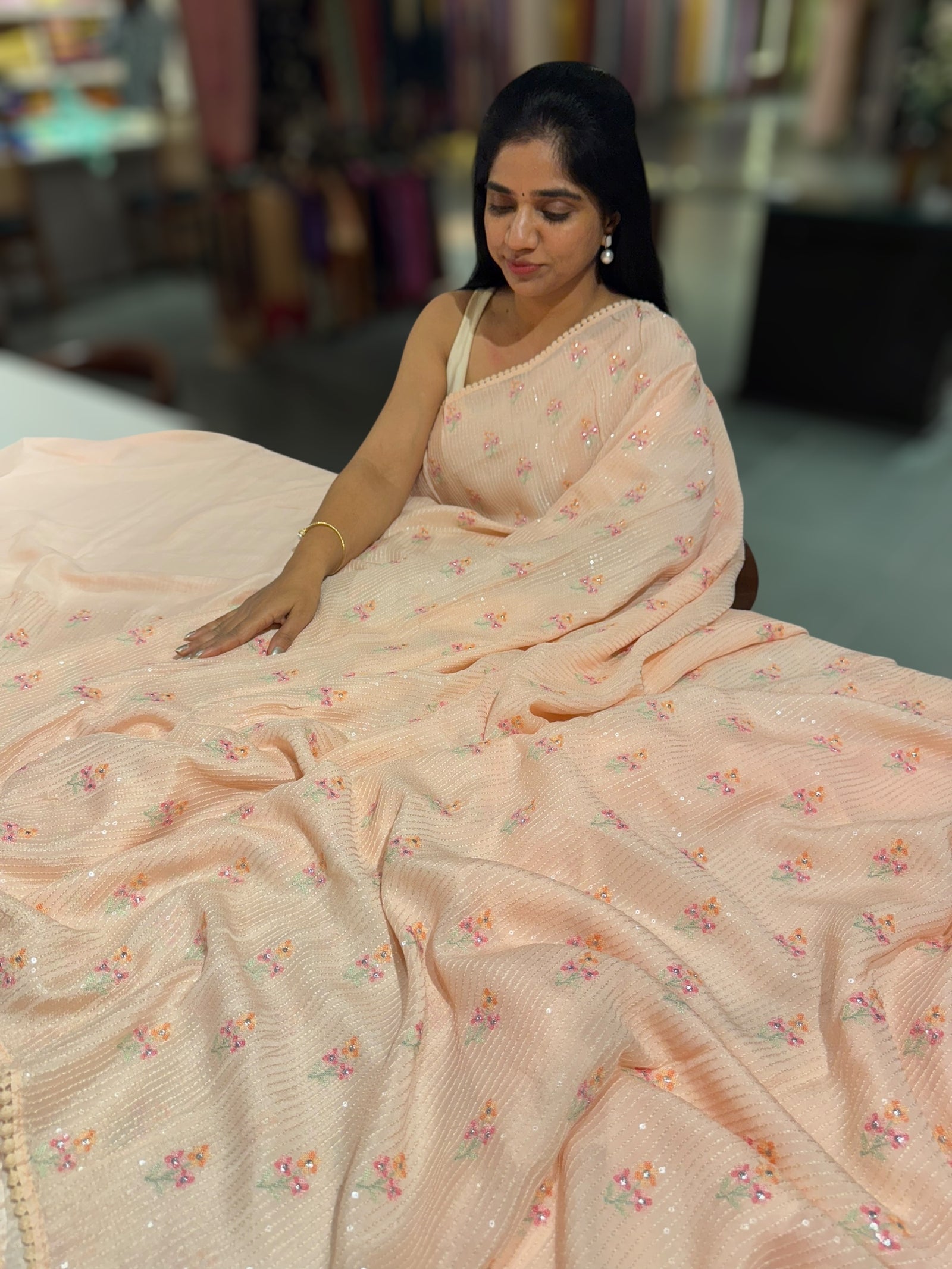 Light peach chiffon saree with embroidery
