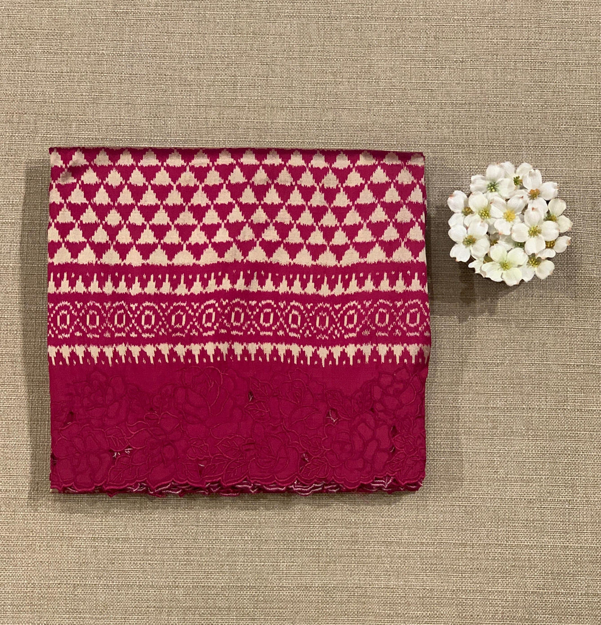 Ruby pink Cambodian–inspired Ikkat Silk Saree with cutwork Rose Border