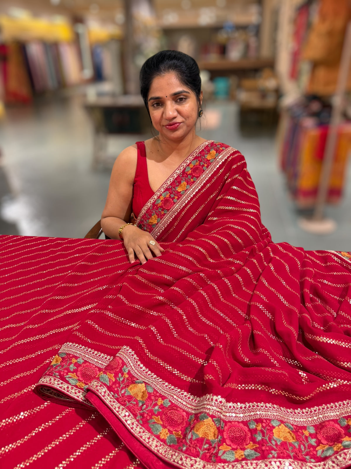 Red Georgette Saree with stick on badla with Sabyasachi borders and blouse
