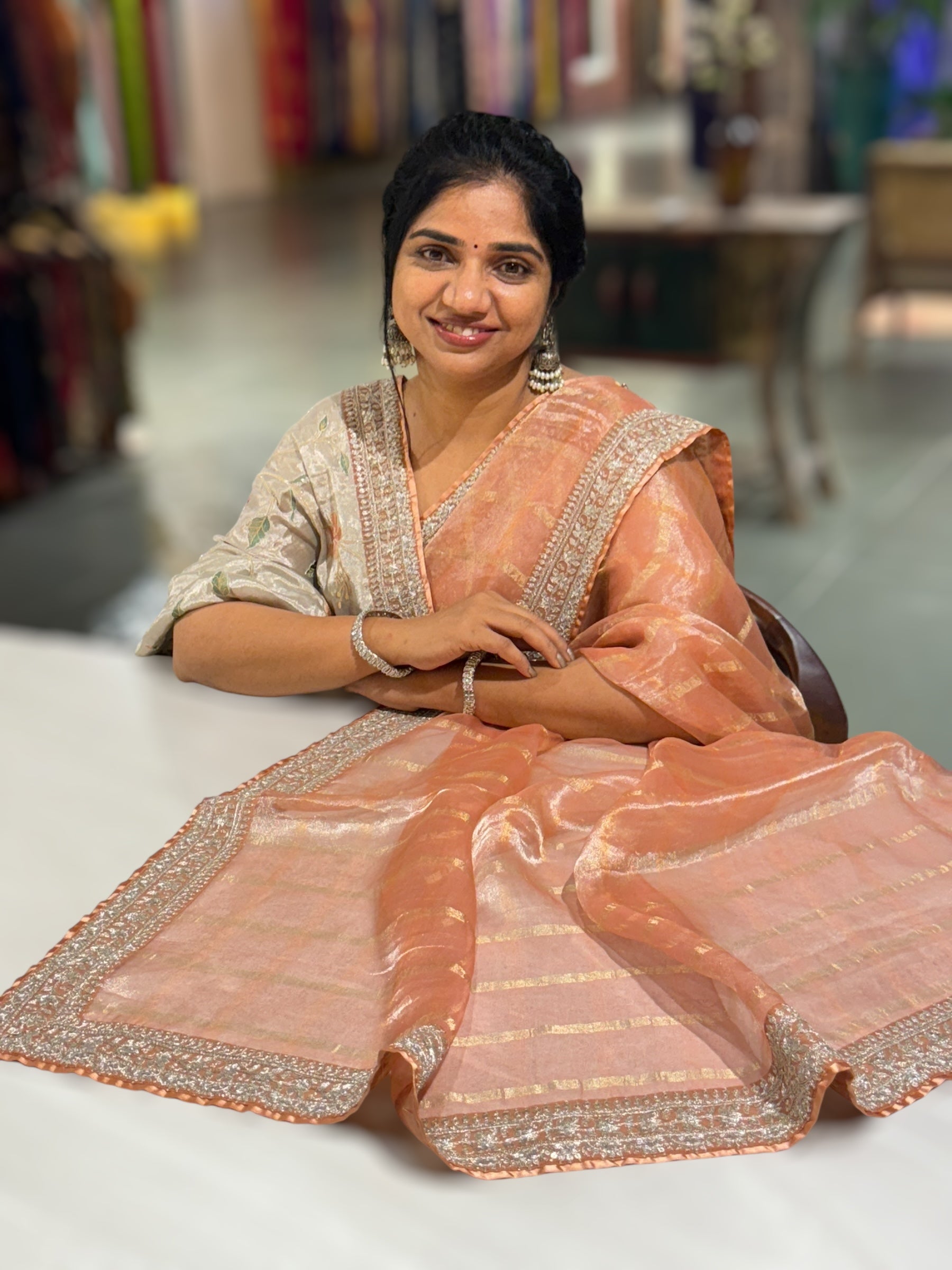 Peach Banarasi Tissue checks Saree with Sabyasachi Borders