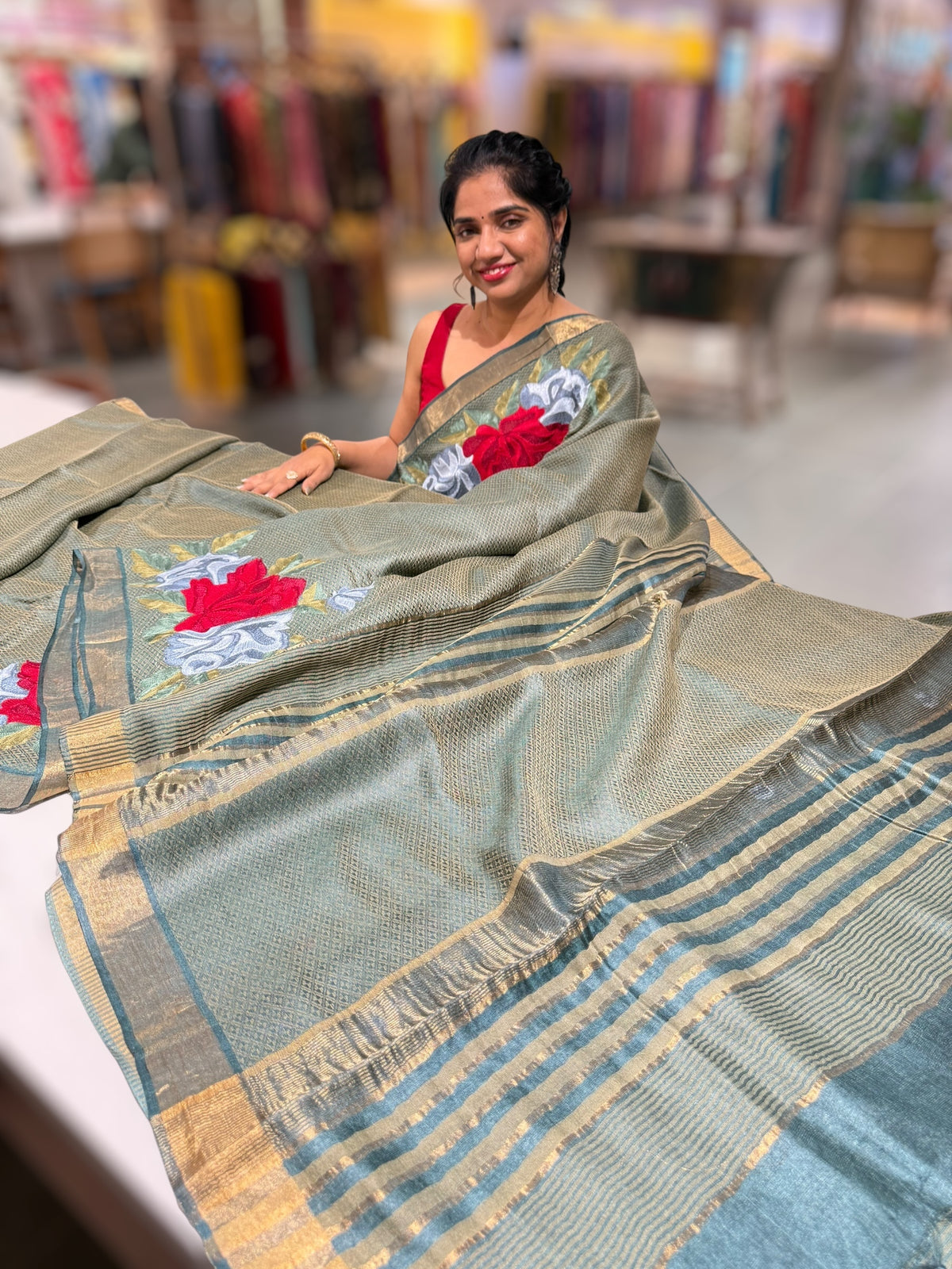 Sage Green Tussar Brocade Saree With Statement Red Rose Embroidery.