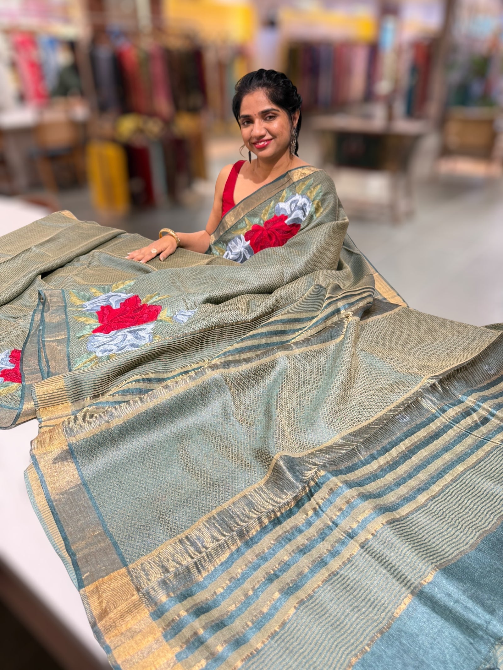 Sage Green Tussar Brocade Saree With Statement Red Rose Embroidery.