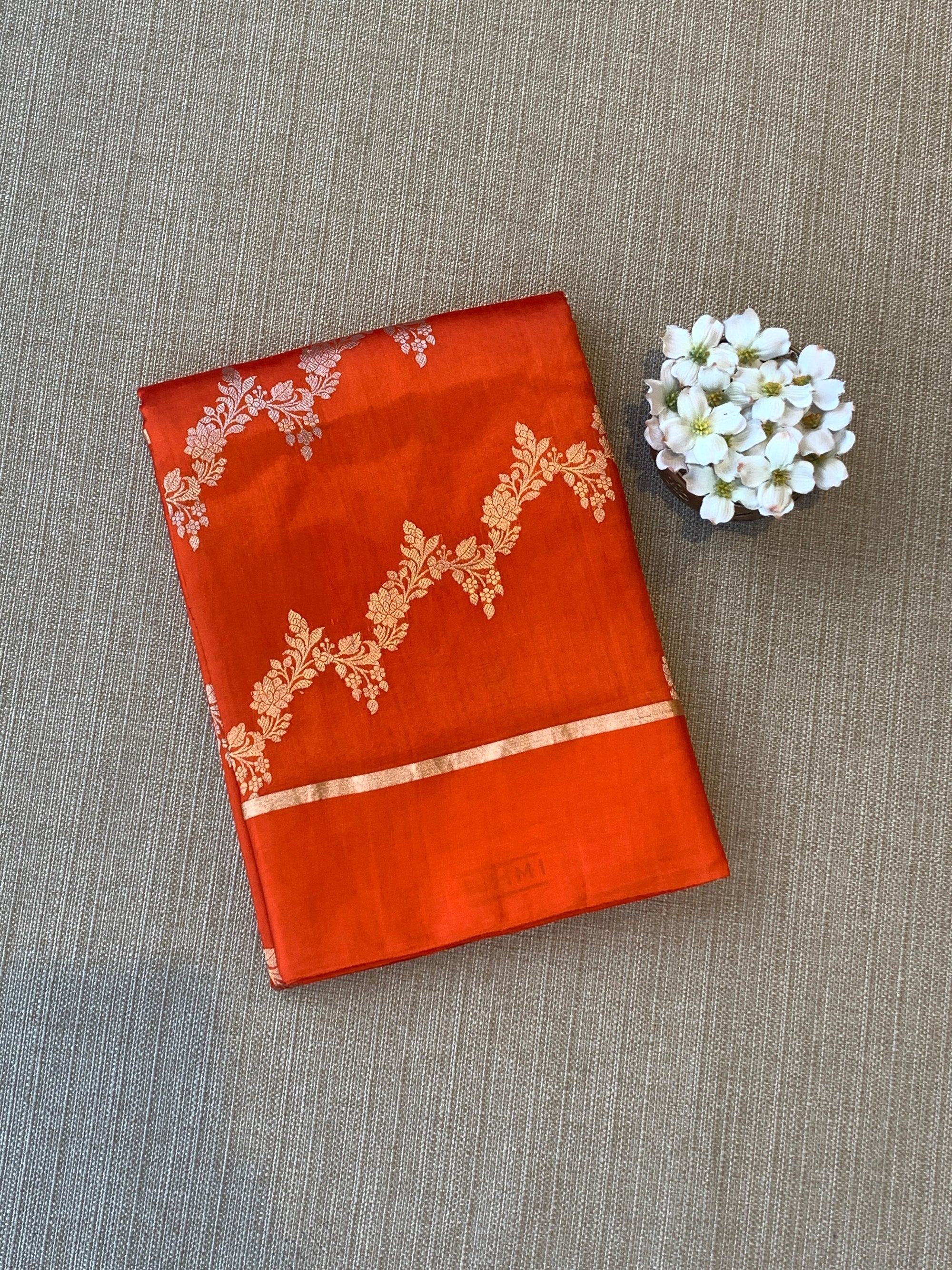 Orange Raw Mangoe Silk Saree in half and half style