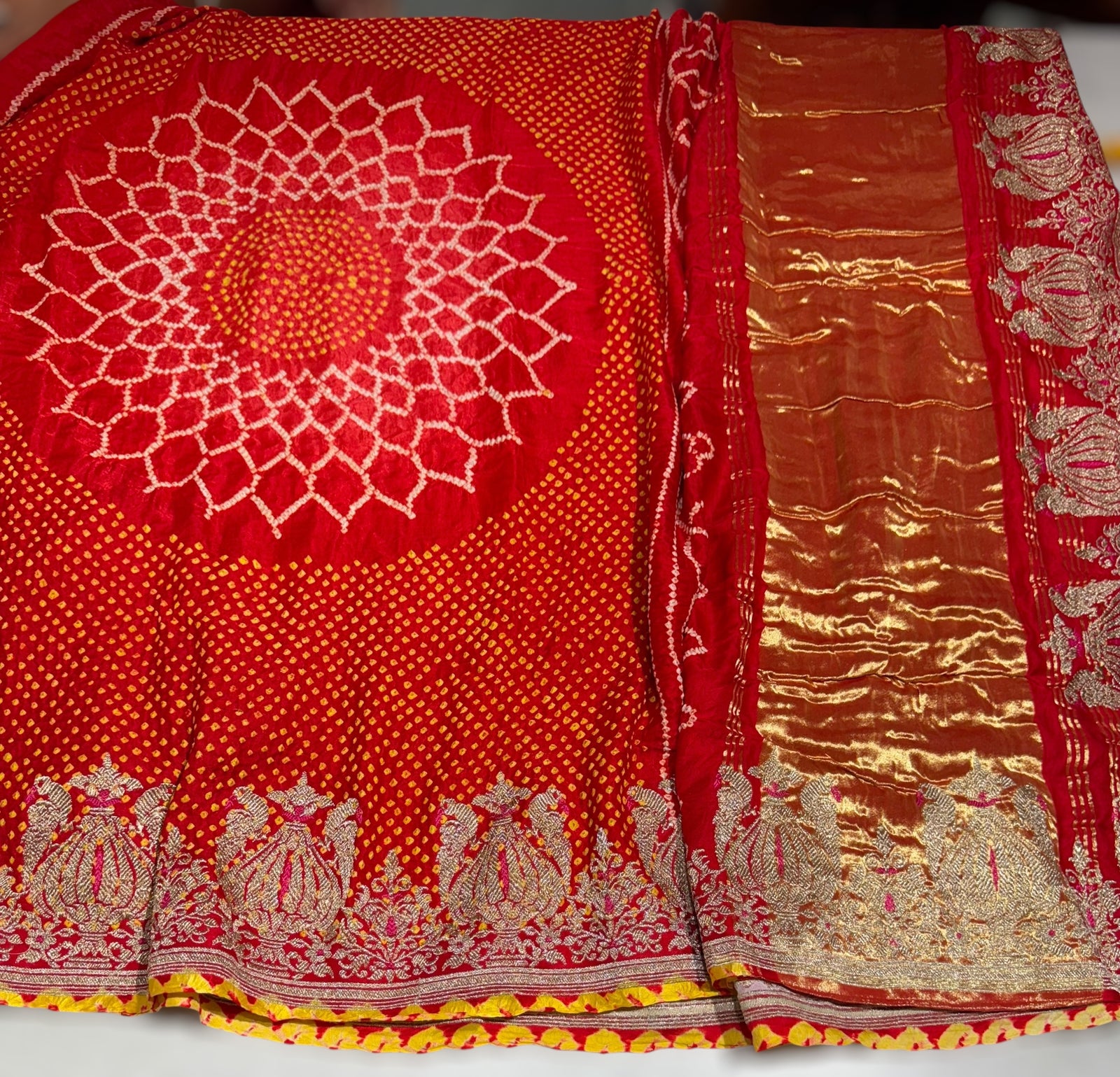 Orangish Red Designer Rai Bandhej Saree With Embroidered Border