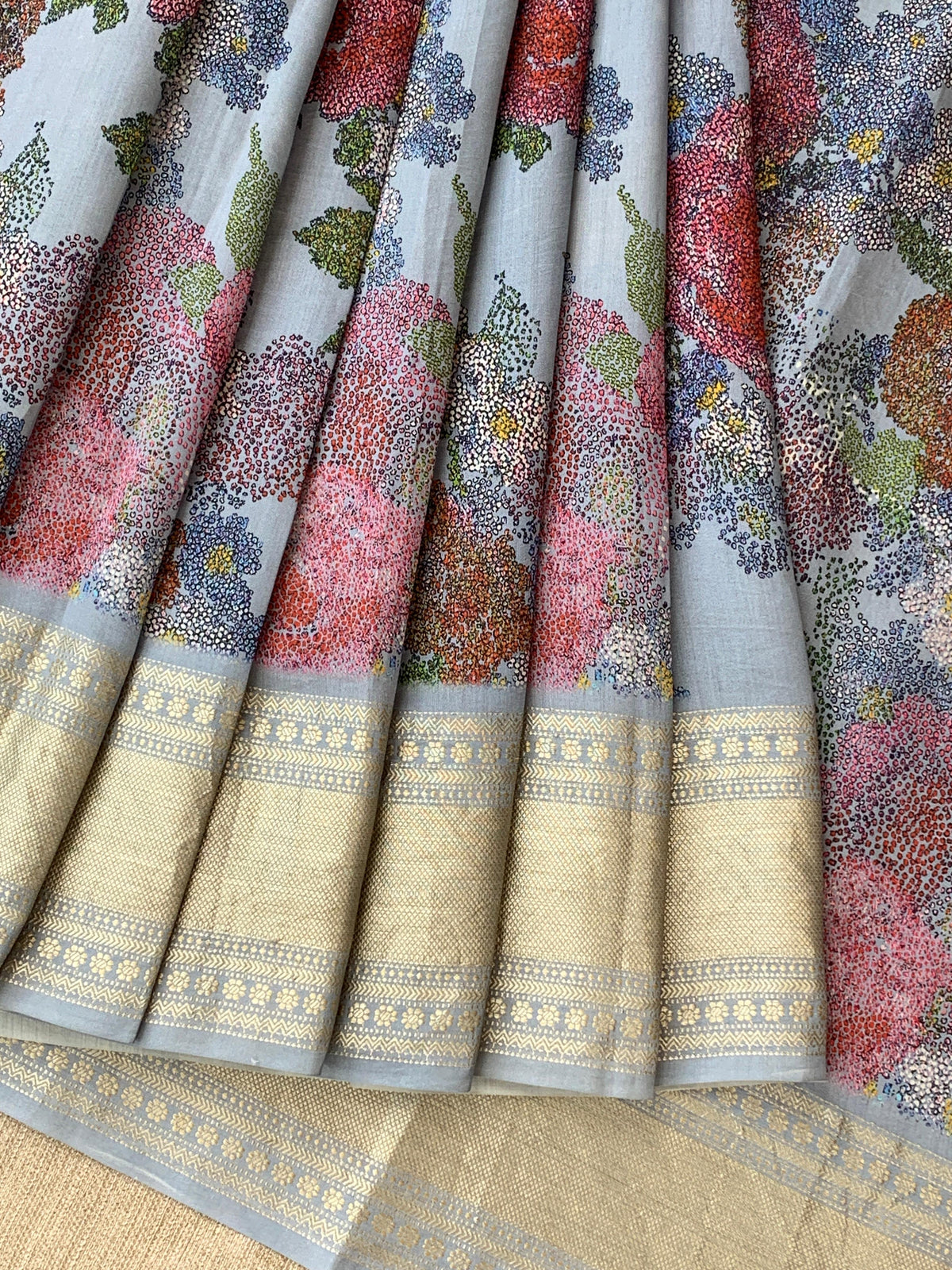 Dusty Blue Pure Handloom Chiniya Silk Saree with stunning Floral Print and zari borders