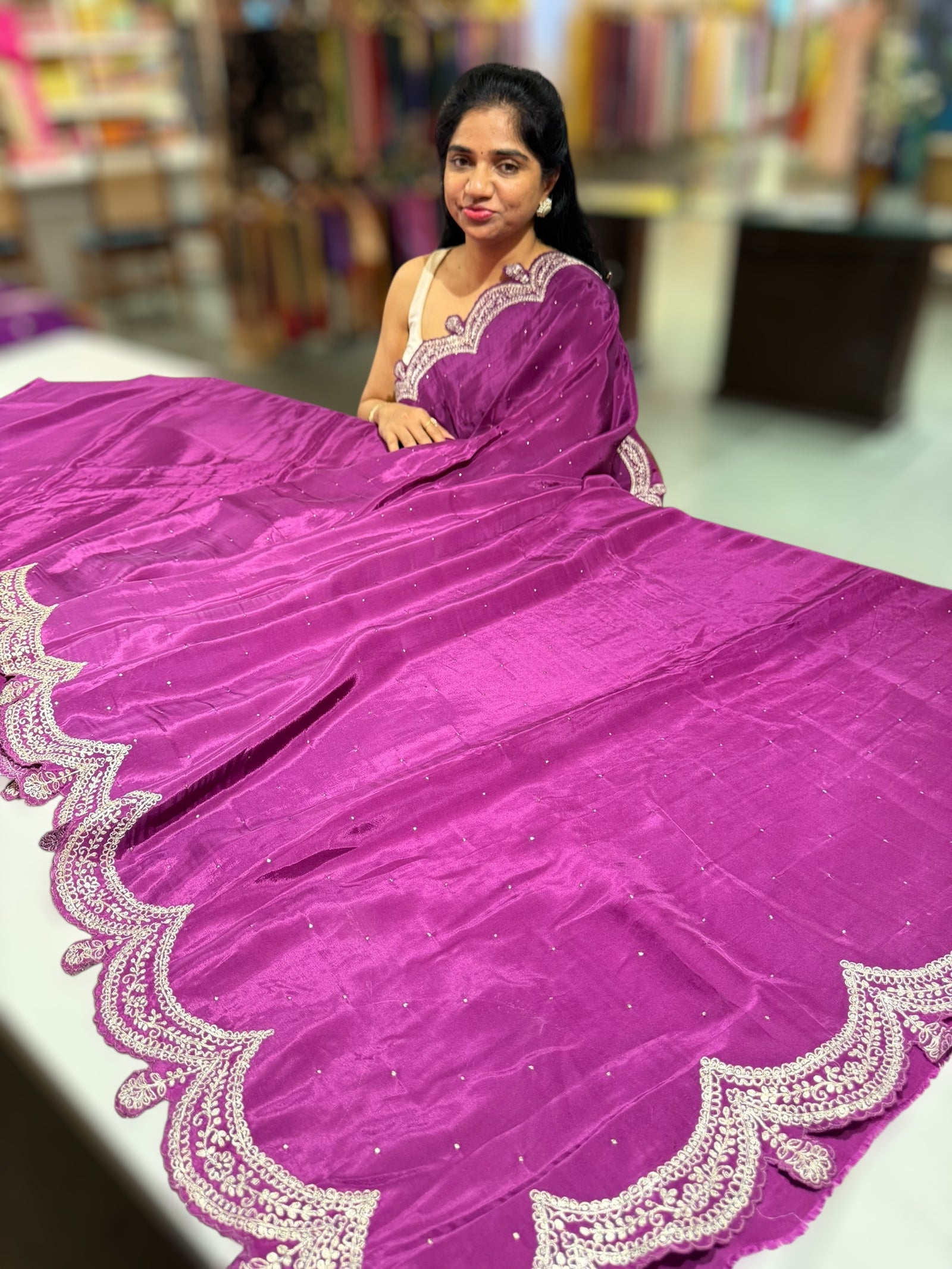 Wine crepe silk saree with scalloped pita border