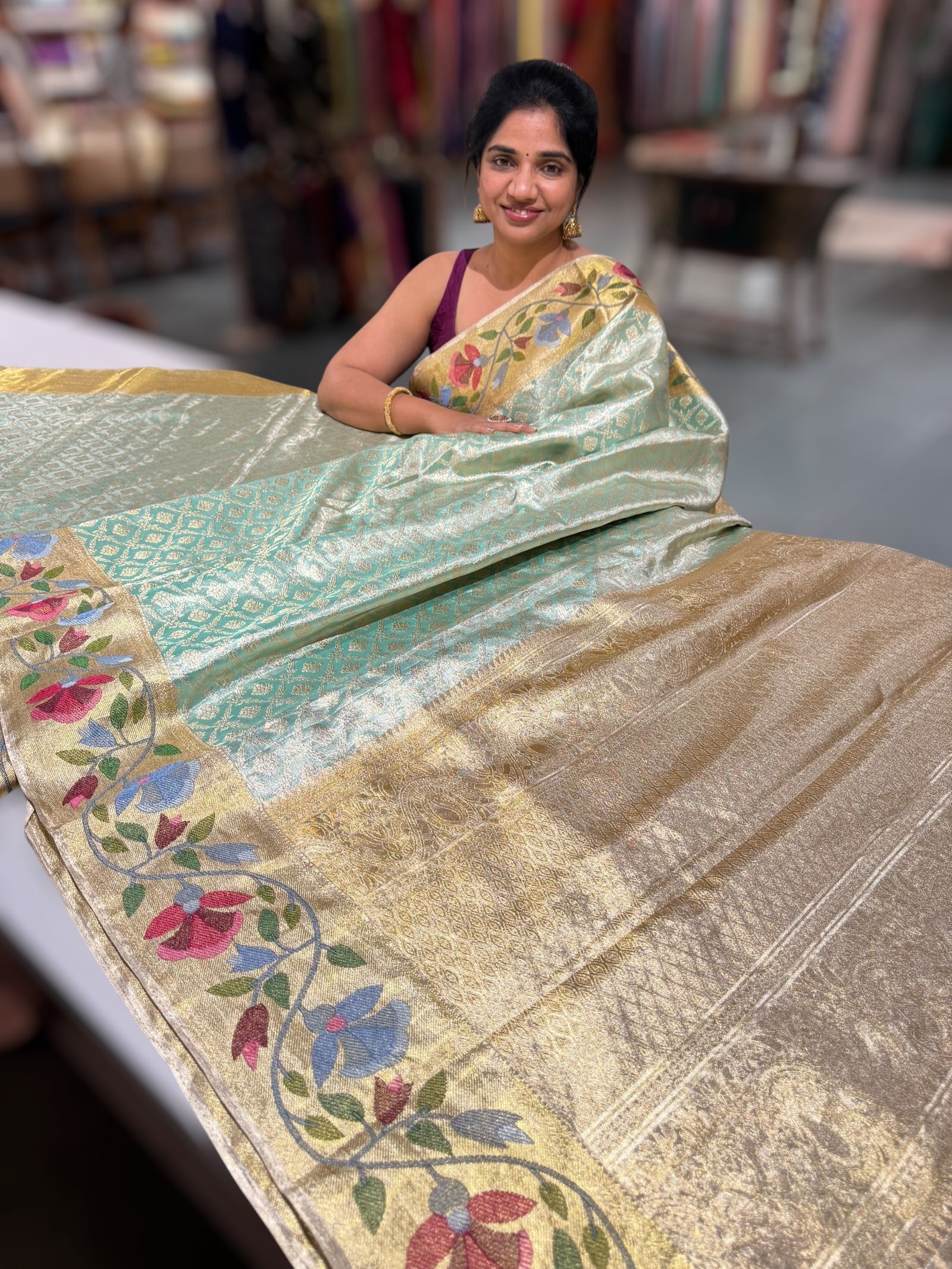 Sea Green Kanchi Tissue Brocade Saree With jamdani inspired embroidery.