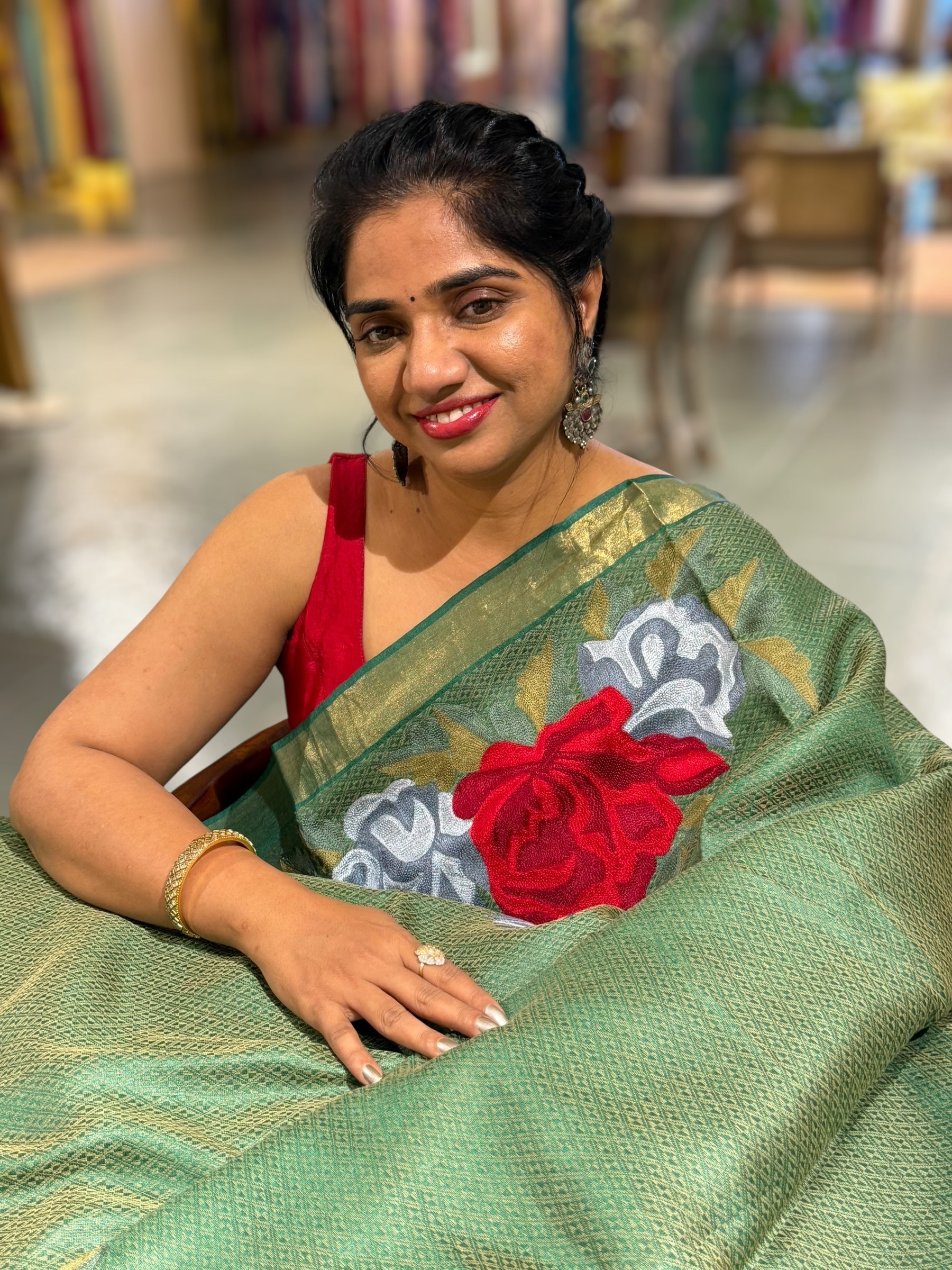 Emerald Green Tussar Brocade Saree With Statement Red Rose Embroidery.
