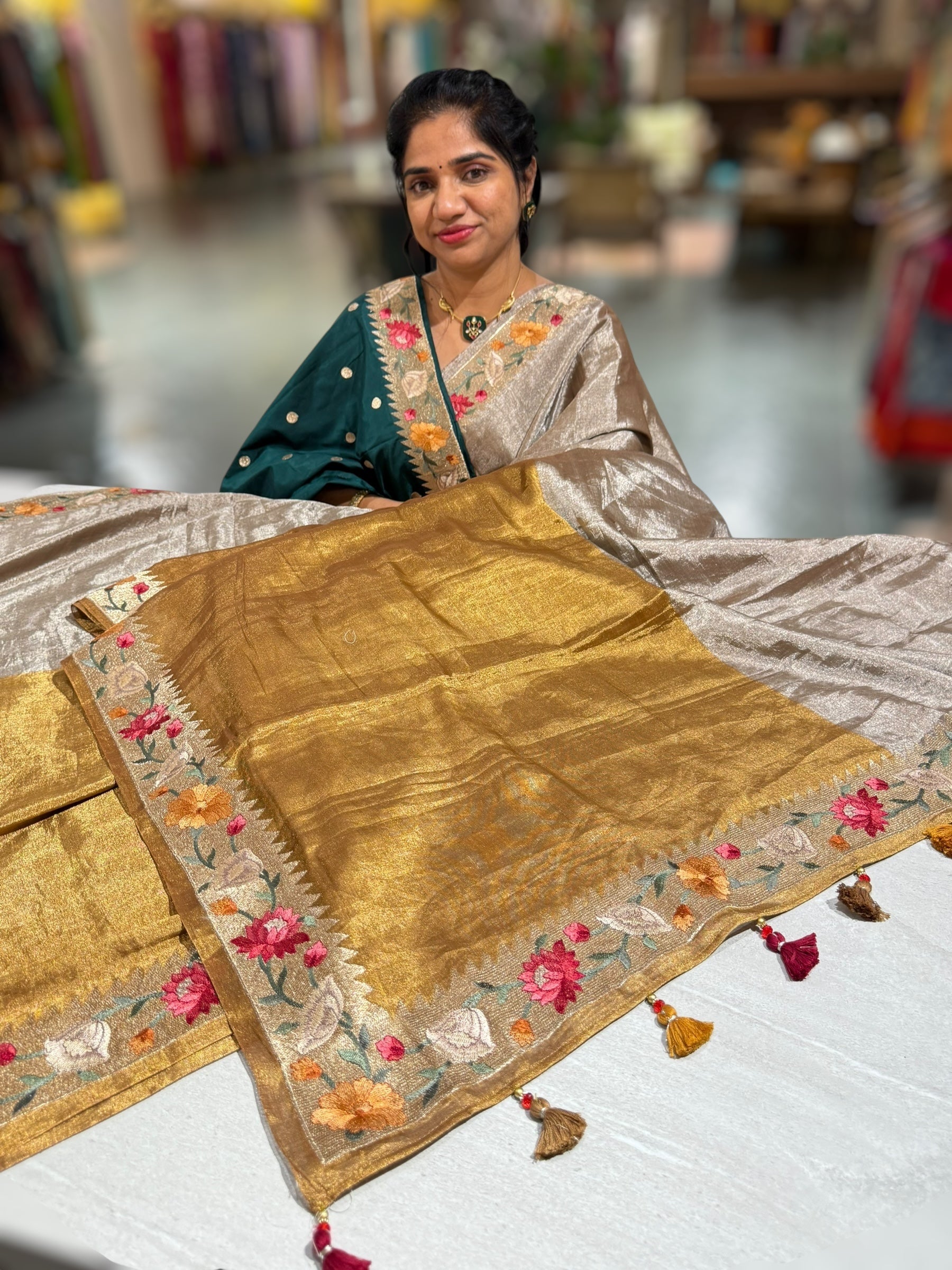 Handloom Tissue Saree with Paithani inspired embroidered border.