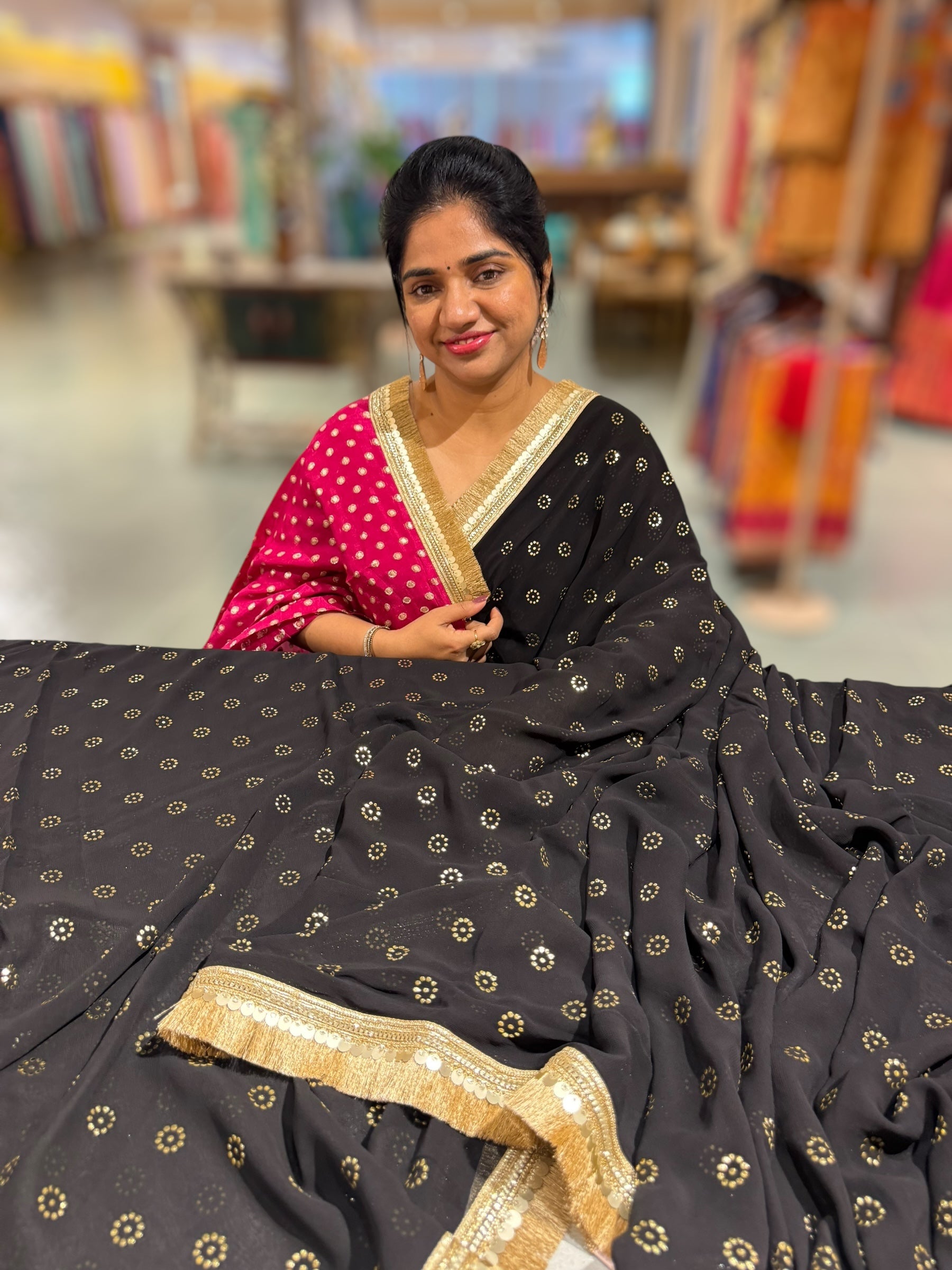 Black Georgette Saree with stick on Badla in flower pattern