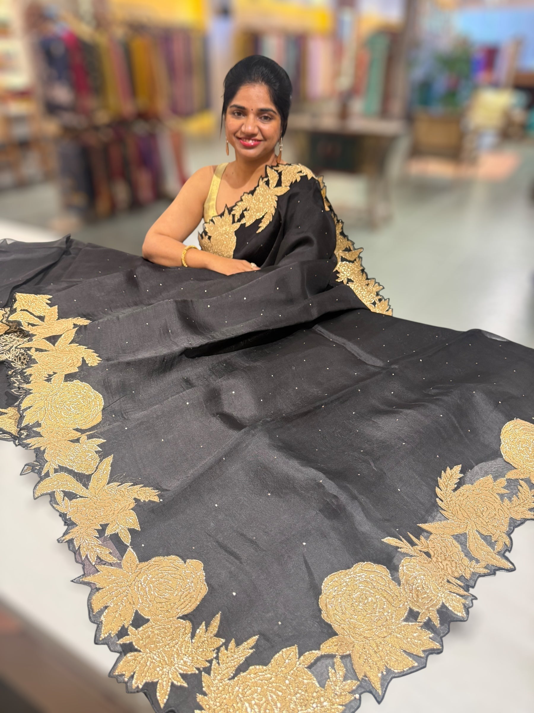 Black Organza Saree with Mukaish work and tissue floral applique cutwork border