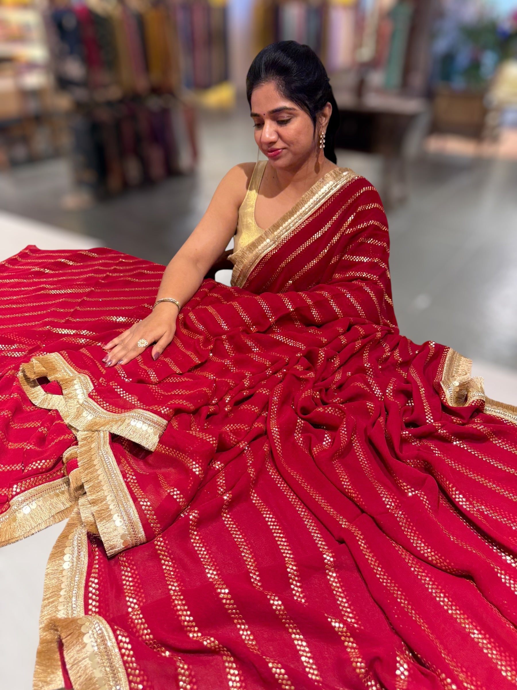 Dark Red Georgette Saree with stick on Badla in stripes pattern and kiran Lace