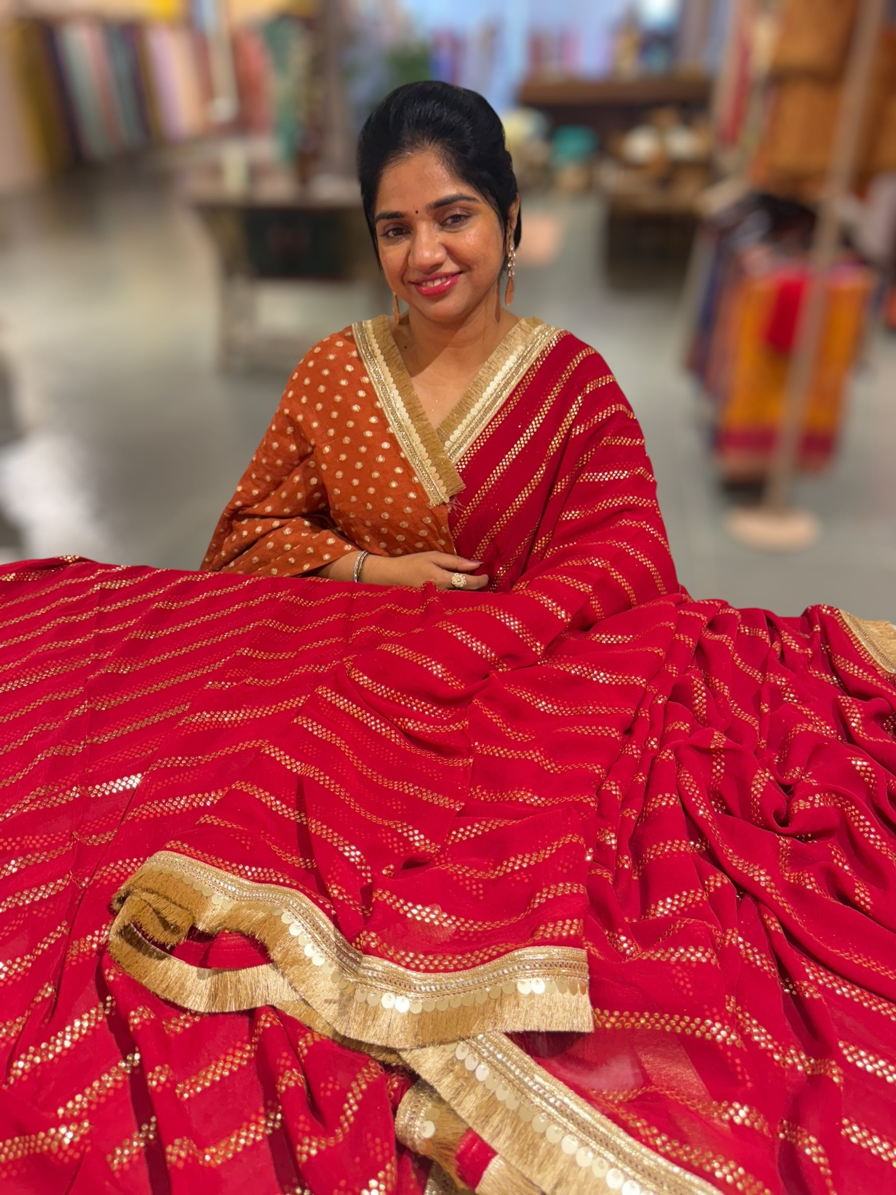 Dark Red Georgette Saree with stick on Badla in stripes pattern and kiran Lace