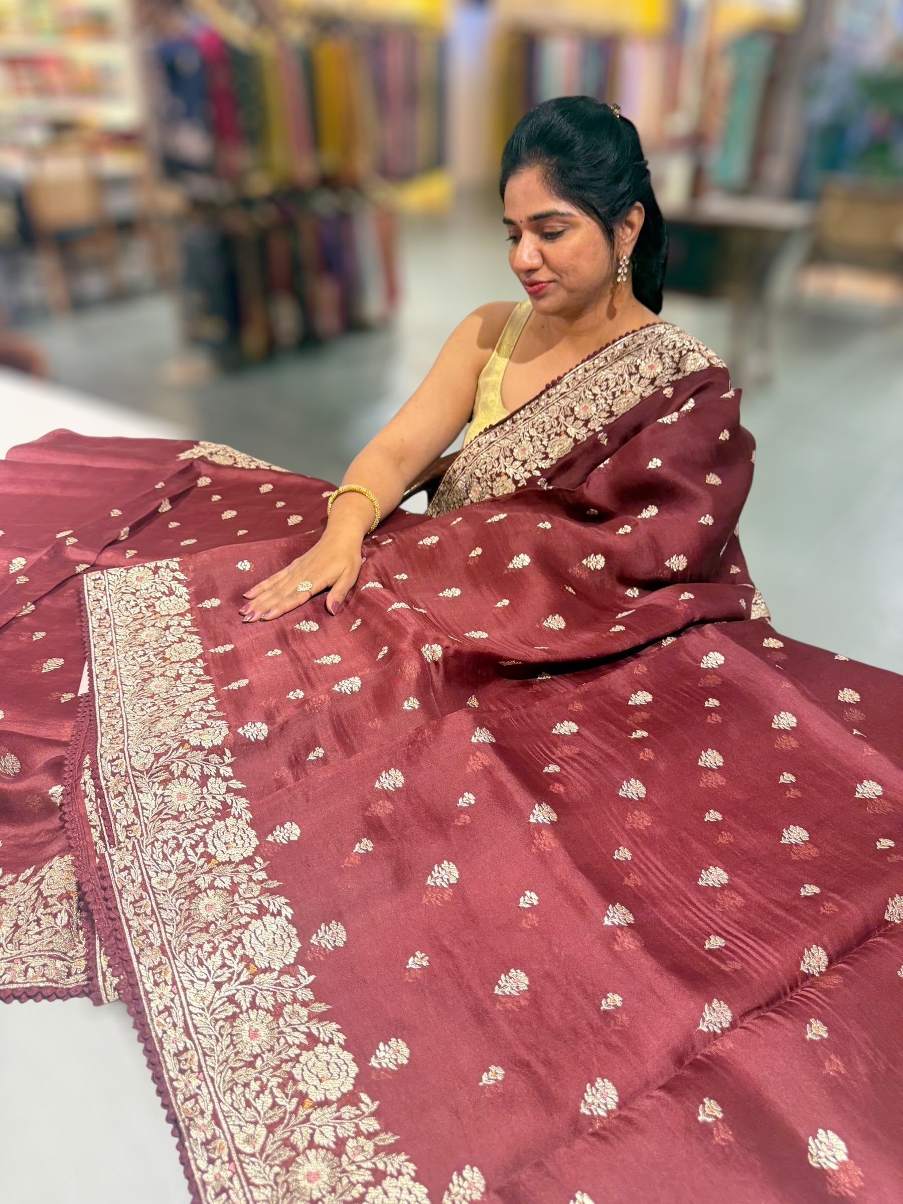 Meroonish Brown  Organza Saree with stunning heavy zari embroidered border and alloevr motifs