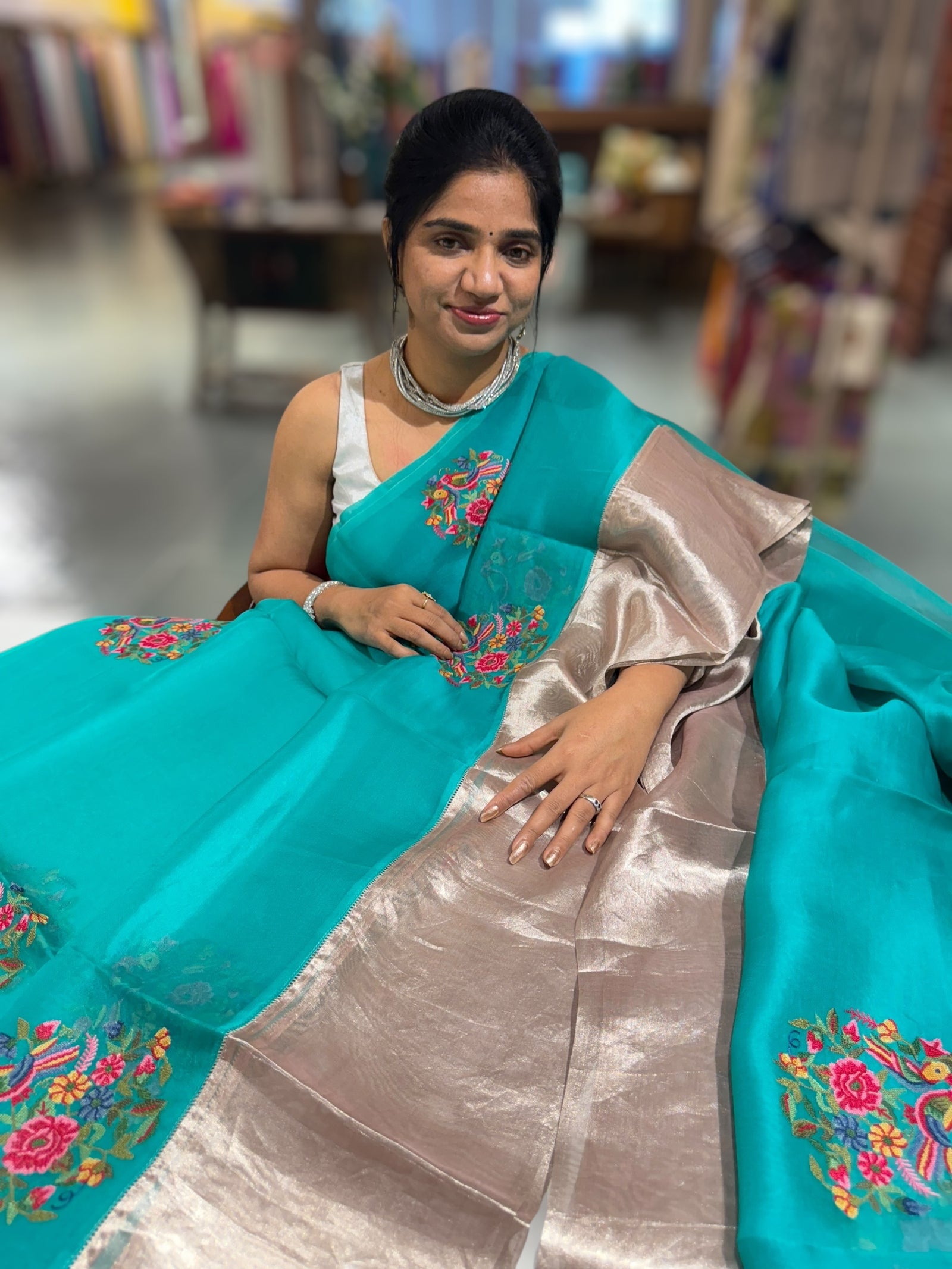 Teal Organza Saree with pure Tissue Border