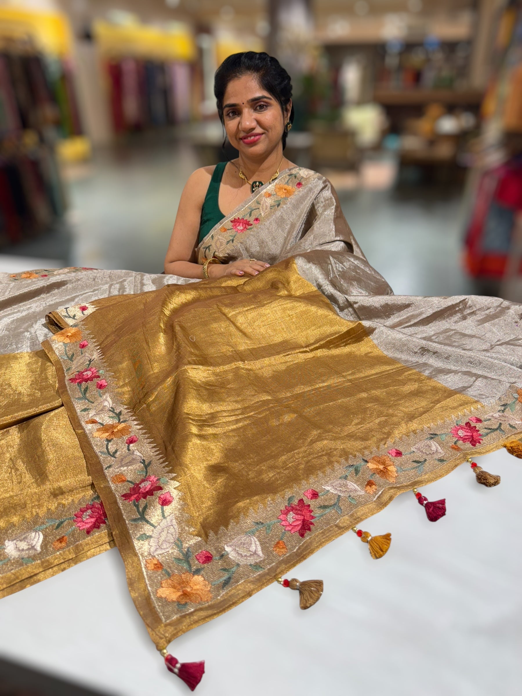 Handloom Tissue Saree with Paithani inspired embroidered border.