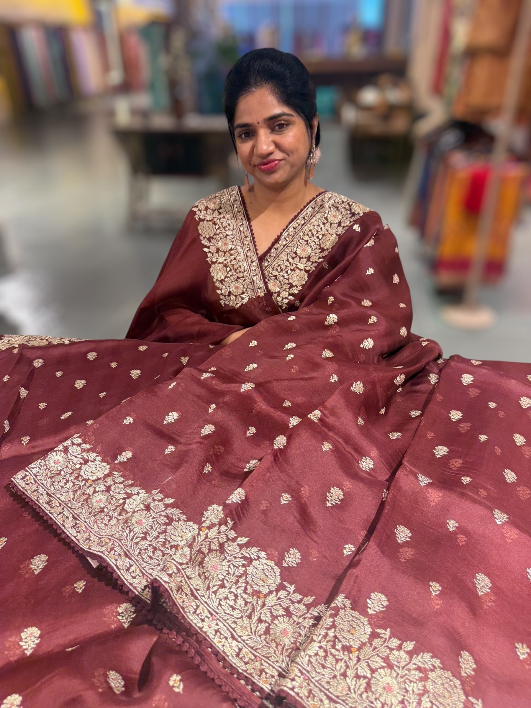 Meroonish Brown  Organza Saree with stunning heavy zari embroidered border and alloevr motifs