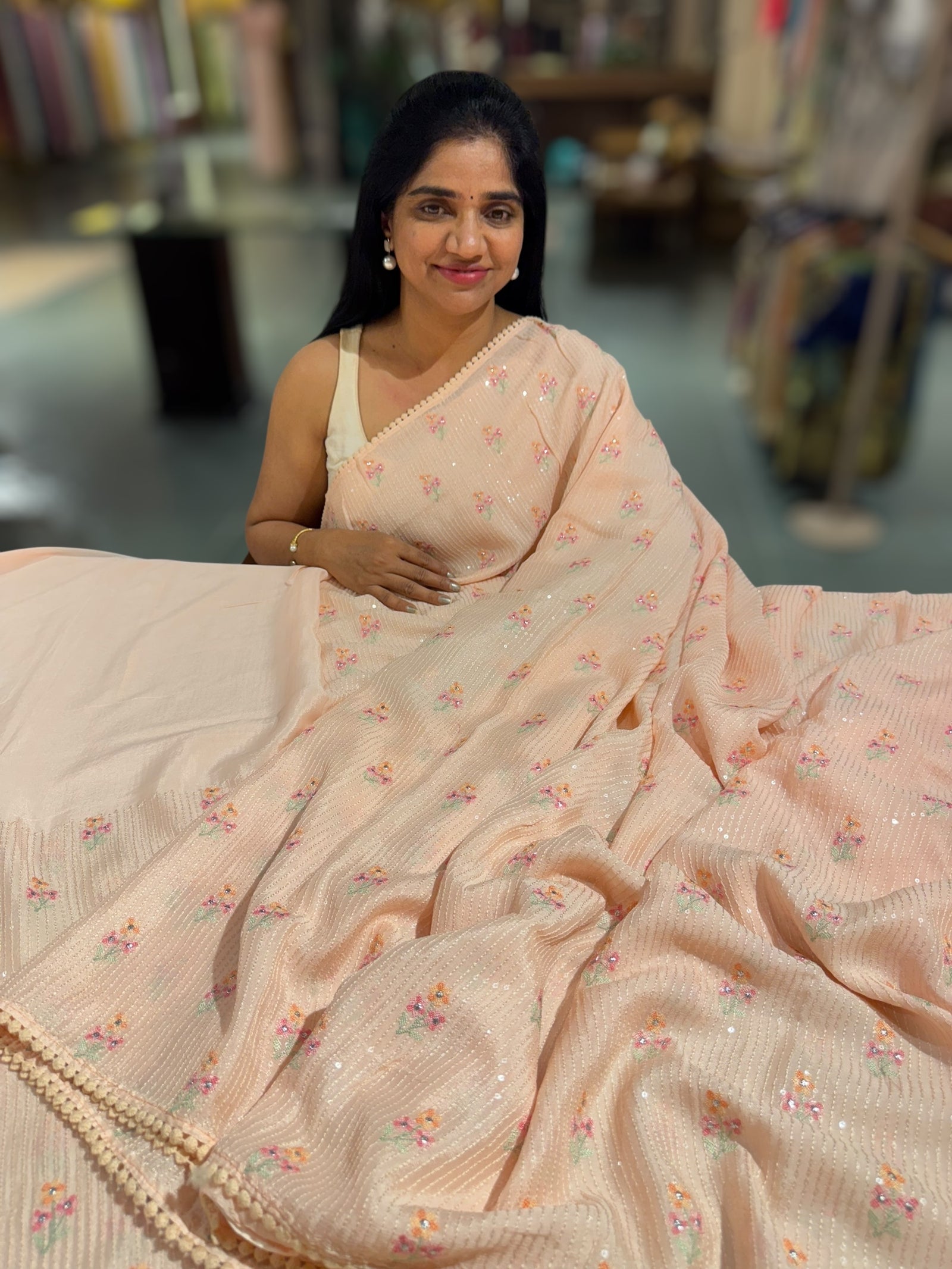 Light peach chiffon saree with embroidery