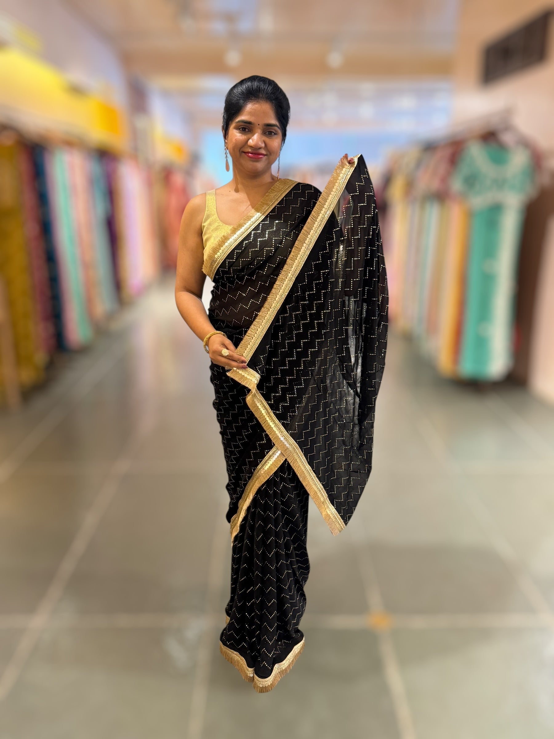 Black Georgette Saree with stick on Badla in zigzag pattern