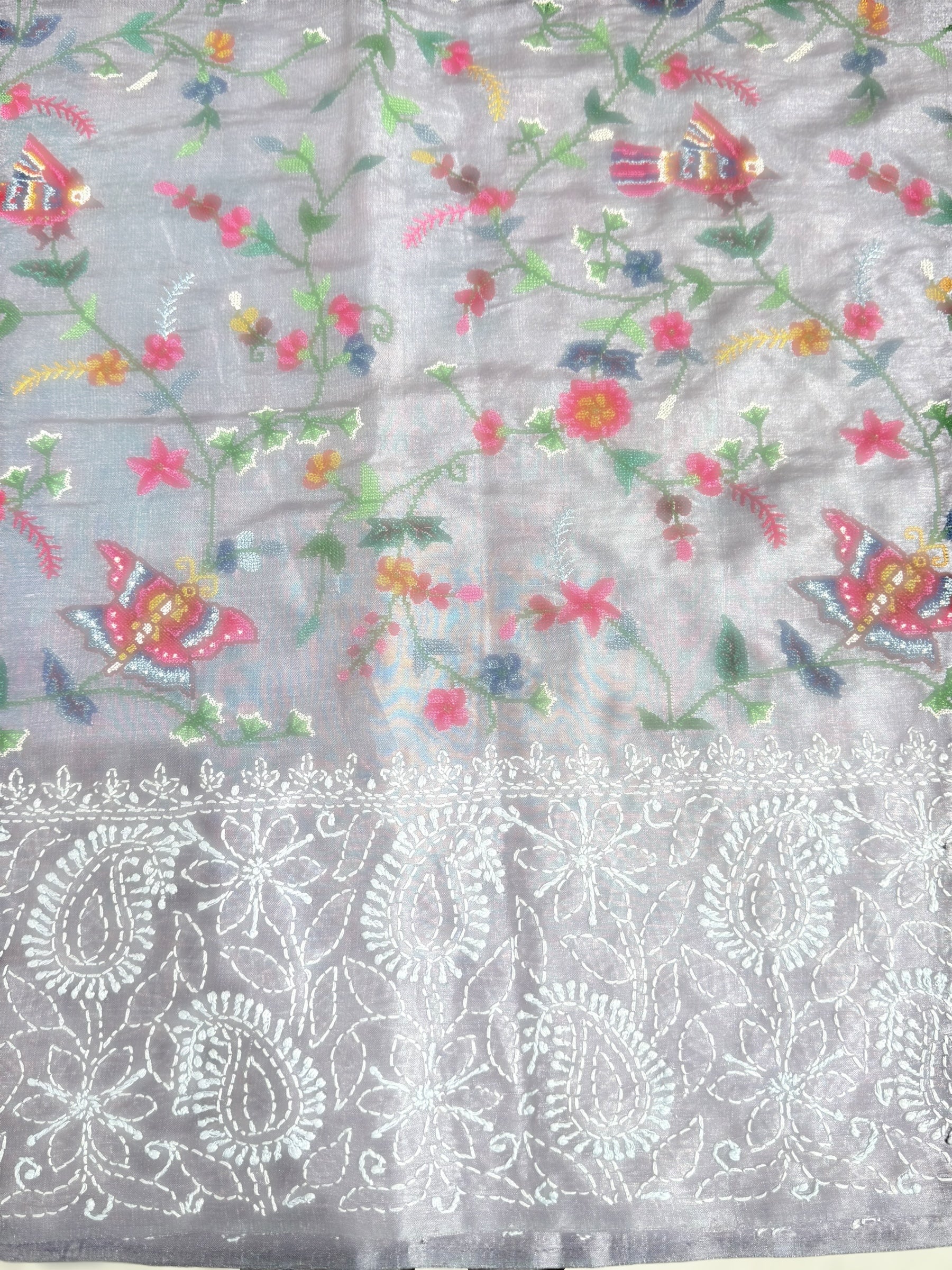 Lilac undertone tussar Saree with lucknowi border and pallu with allover petite point embroidery.