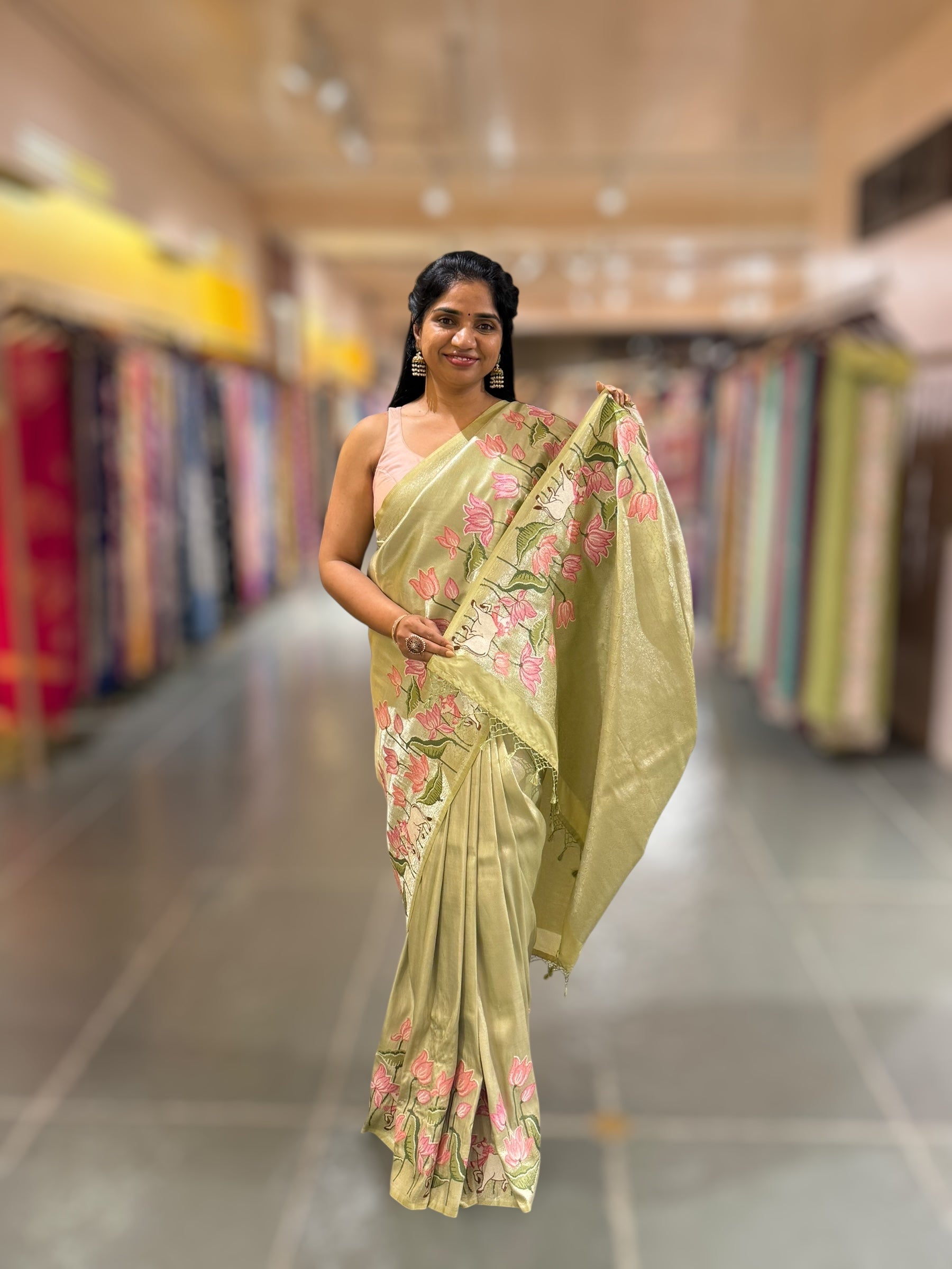 Pista Banarasi Brocade Saree with Pichwai Embroidered Skirt Border.