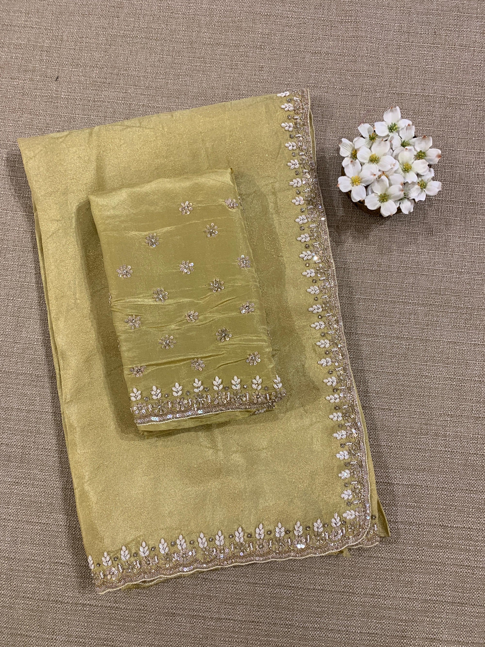 Pastel Yellow Tissue Gorgette Saree With Hanwork Border and Blouse.