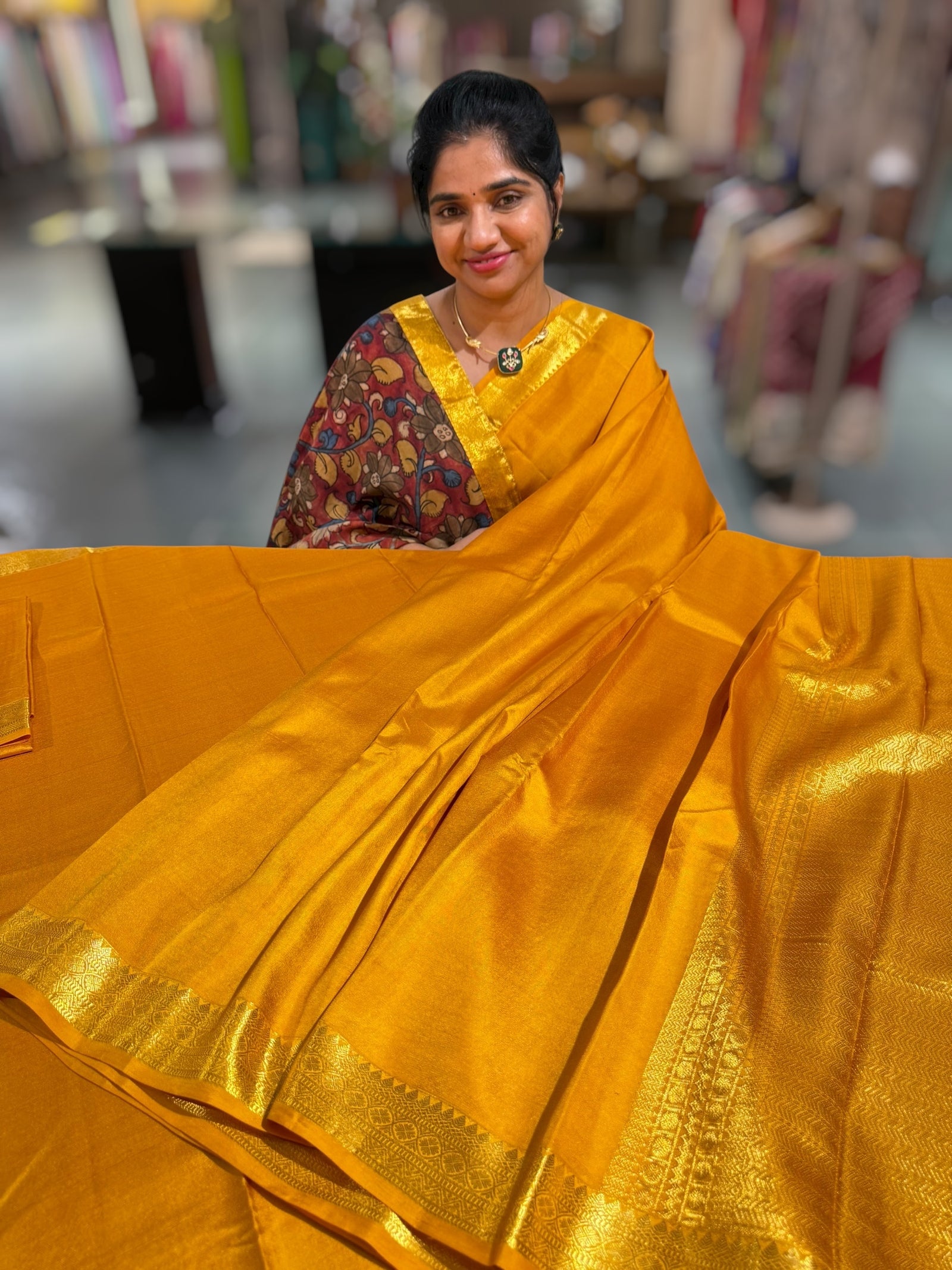 Mustard vintage Kanchipuram silk saree with pen kalamkari blouse