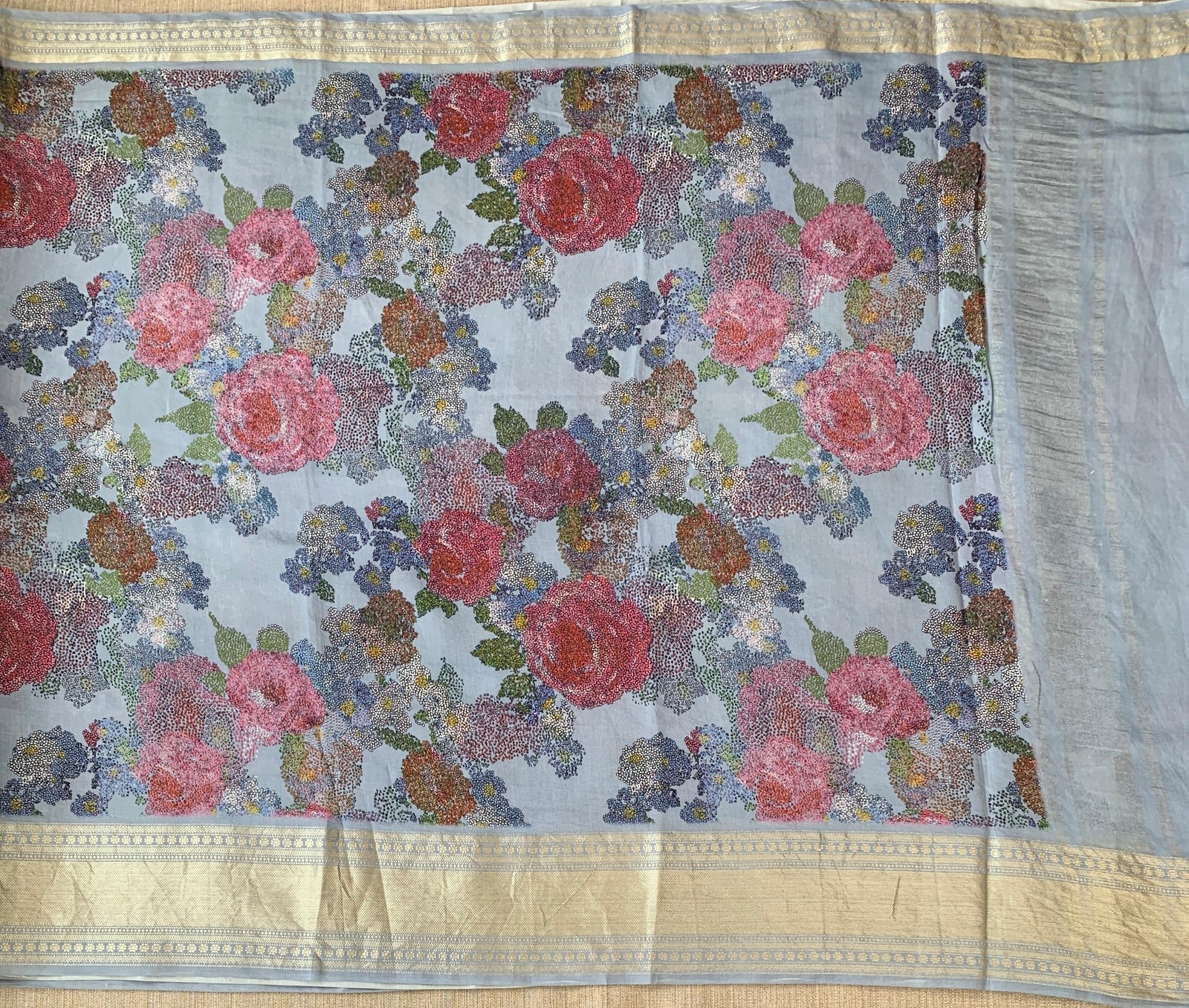 Dusty Blue Pure Handloom Chiniya Silk Saree with stunning Floral Print and zari borders