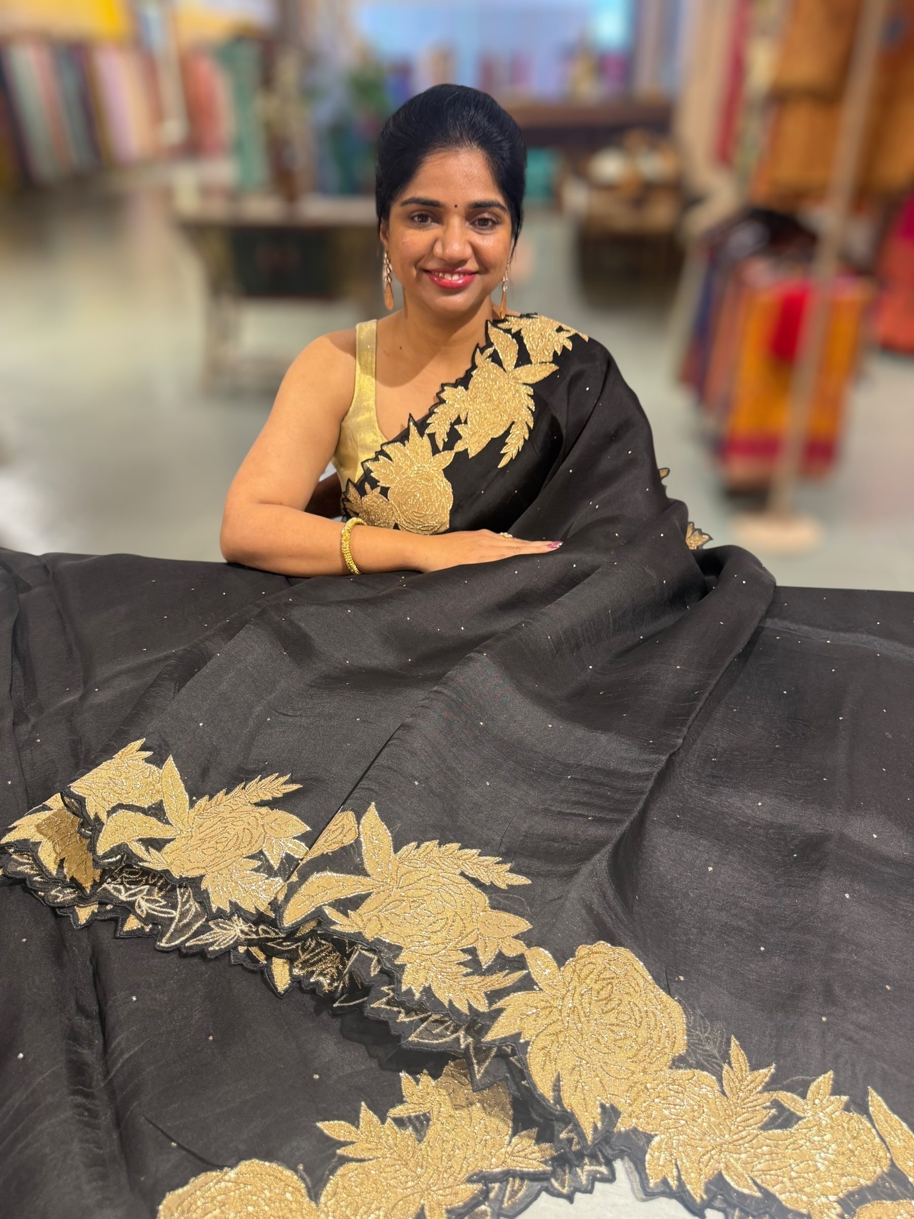 Black Organza Saree with Mukaish work and tissue floral applique cutwork border