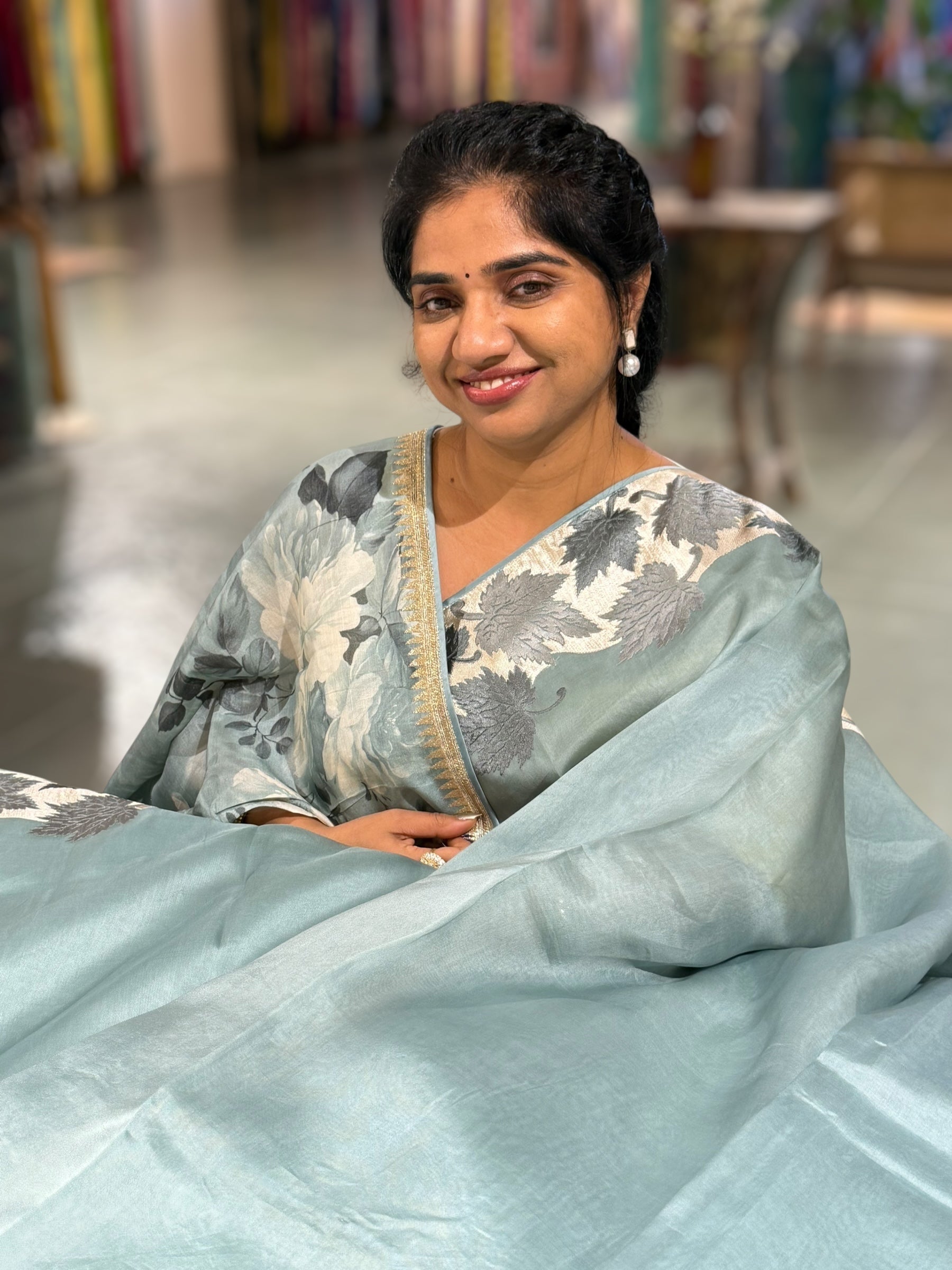 Dark Powder Blue Organza Saree with Stunning Leaf Embroidered Border