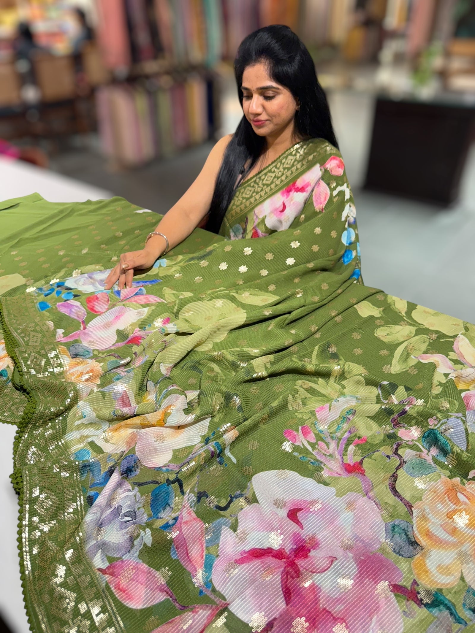 Mehendi Green georgette sequence saree with statement floral print