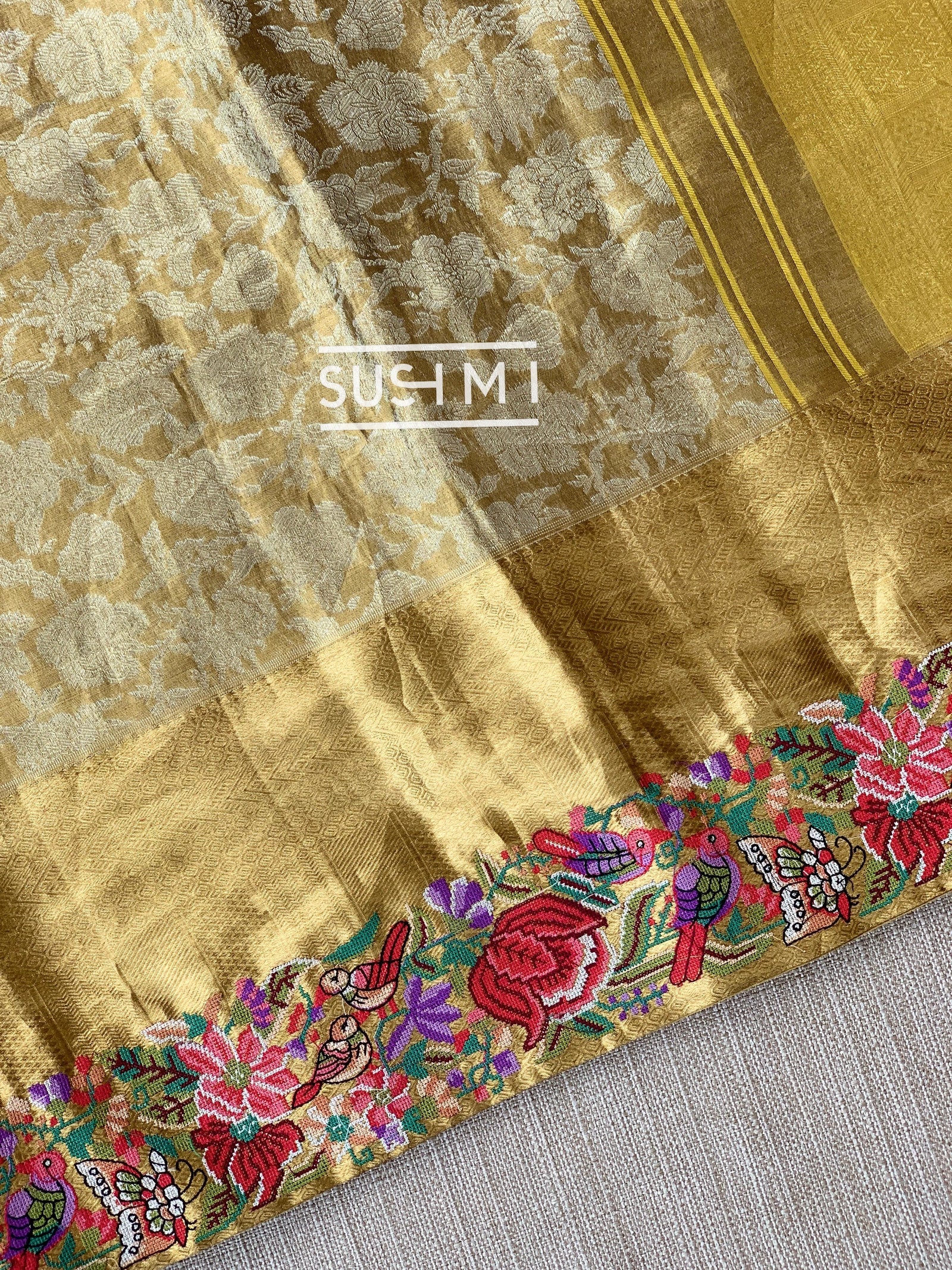 Molten Gold Kanjeevaram Tissue Sareewith petite point embroidery : S62F089