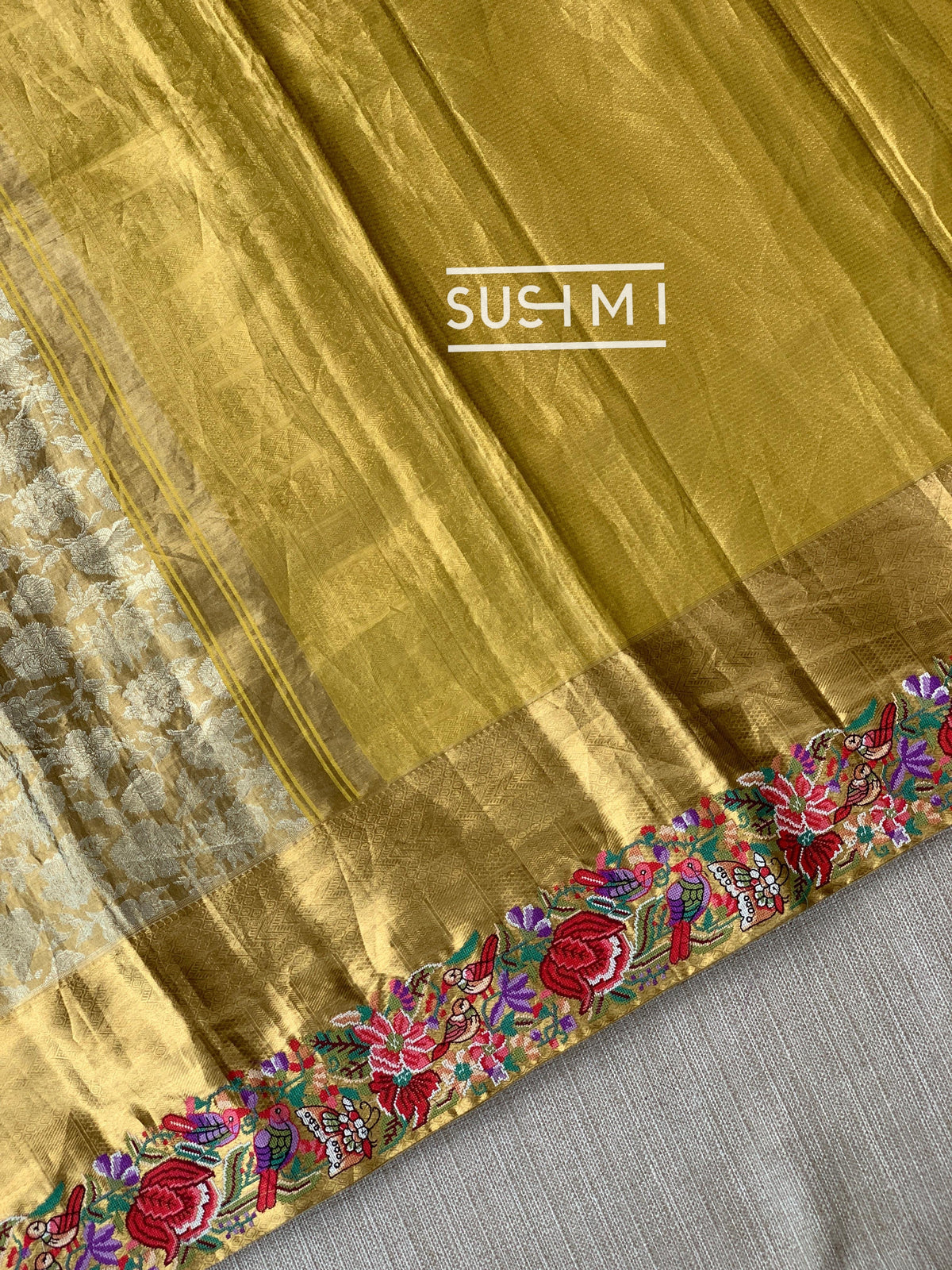 Molten Gold Kanjeevaram Tissue Sareewith petite point embroidery : S62F089