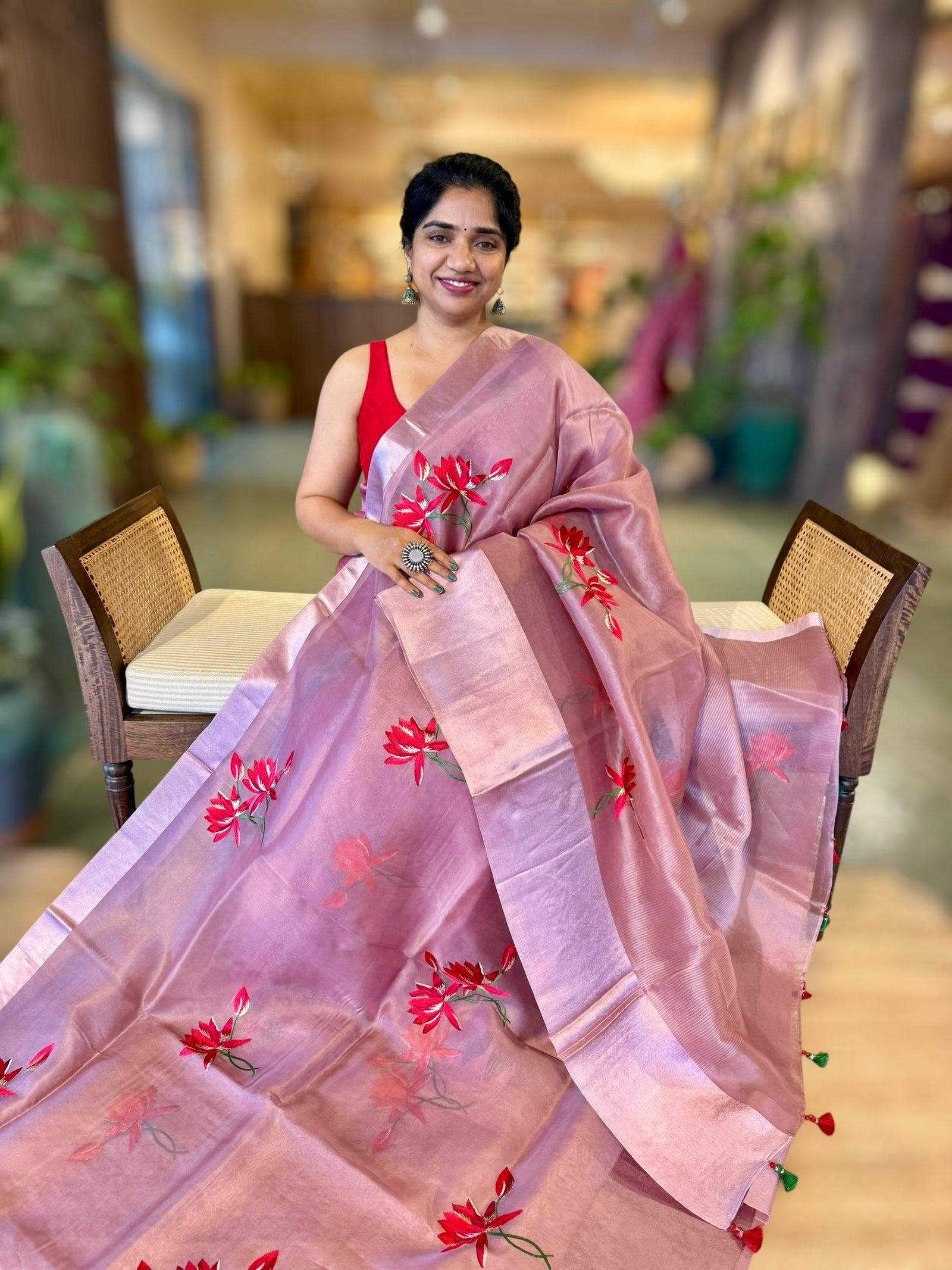 Mauve Organza Saree with Lotus flower embroidery and Satin Borders.